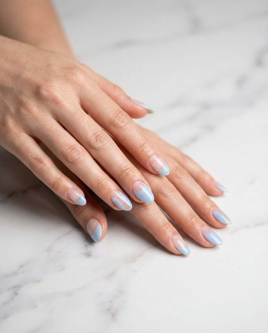 Minimalist Baby Blue Nails with a Single Pearl