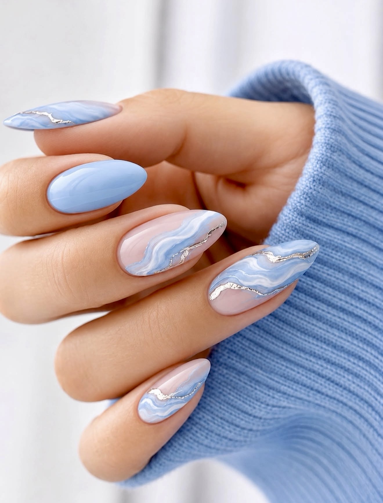 Baby Blue Marble Swirl Almond Nails