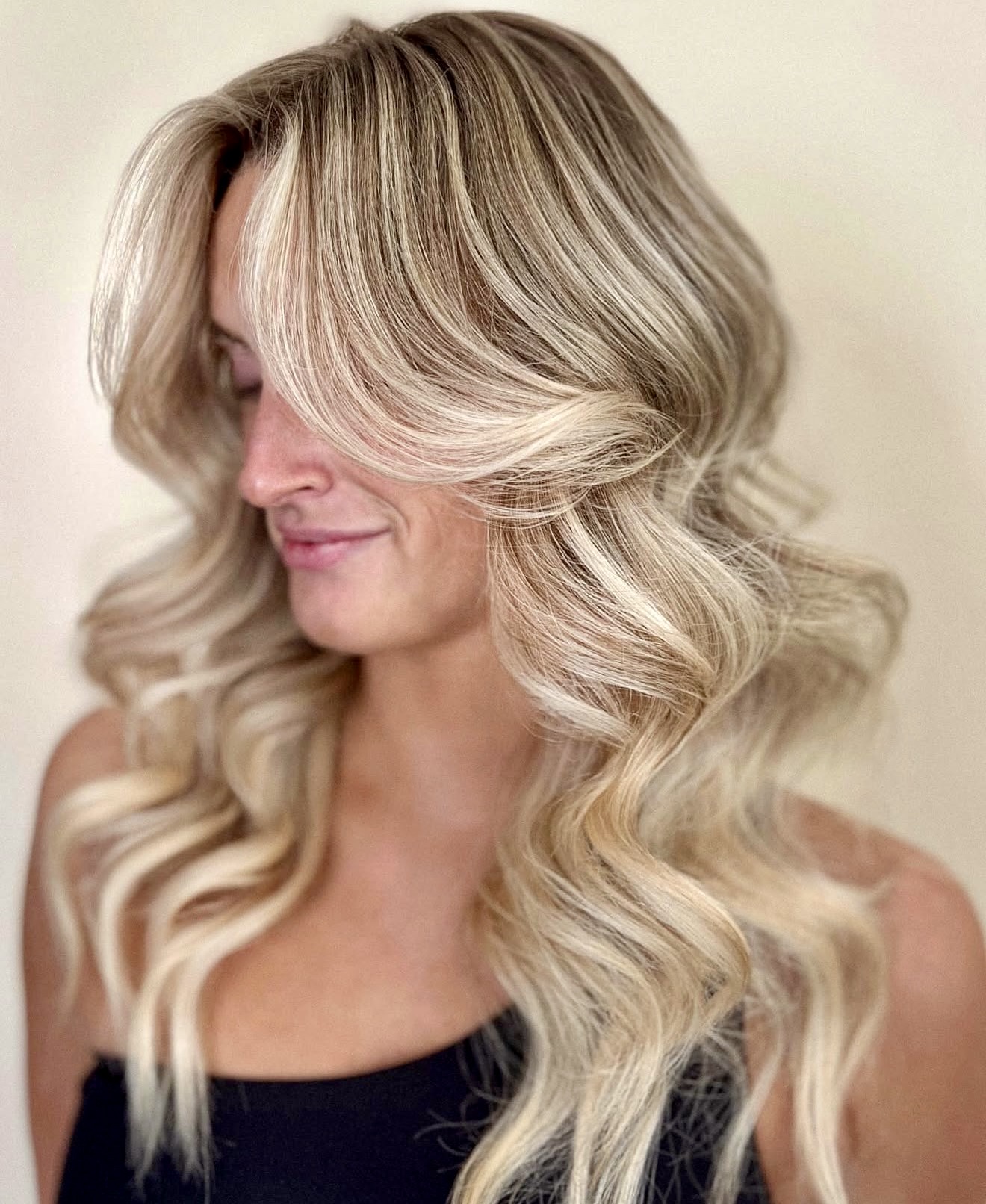 Beachy Blonde Waves With Face Framing Layers