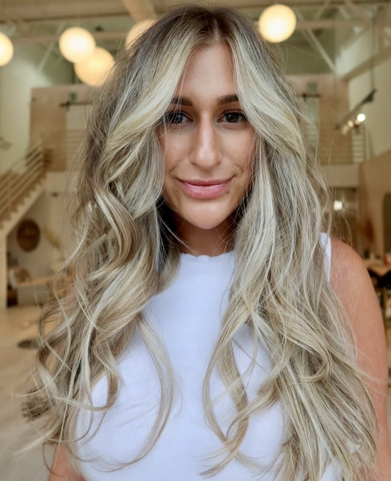 Beachy Bronde Waves With Face-Framing Layers