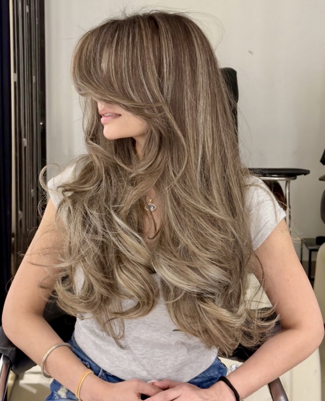 Beachy Bronde Waves With Face-Framing Layers