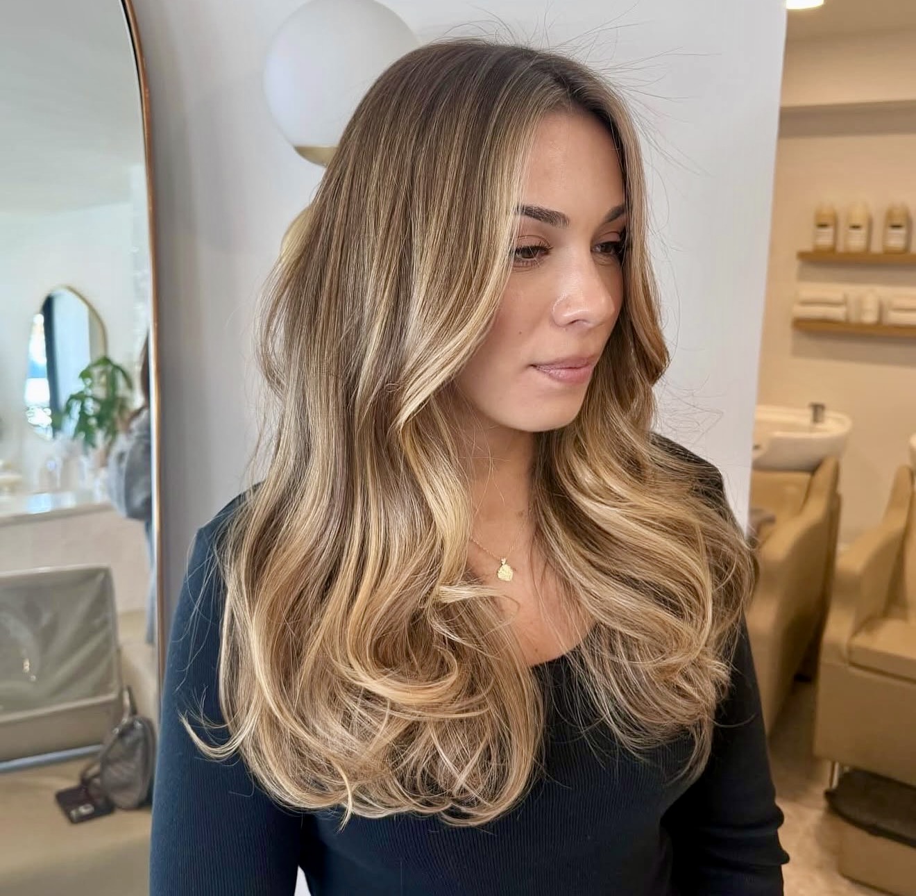 Beachy Honey Blonde Waves With Face Framing Layers