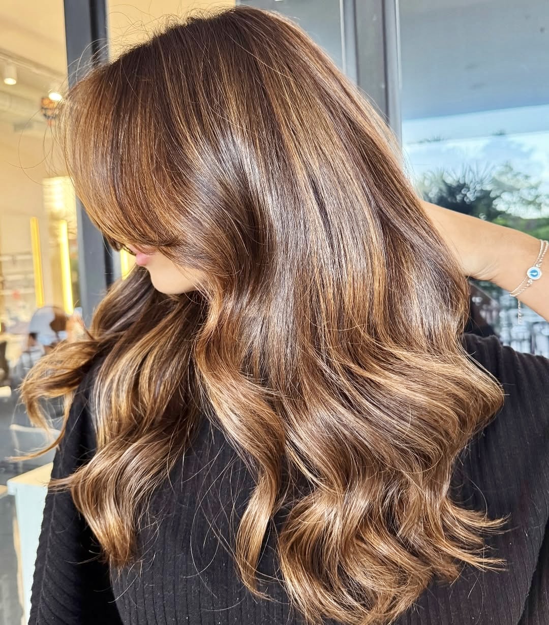 Caramel Highlights With Lived-In Brunette Waves