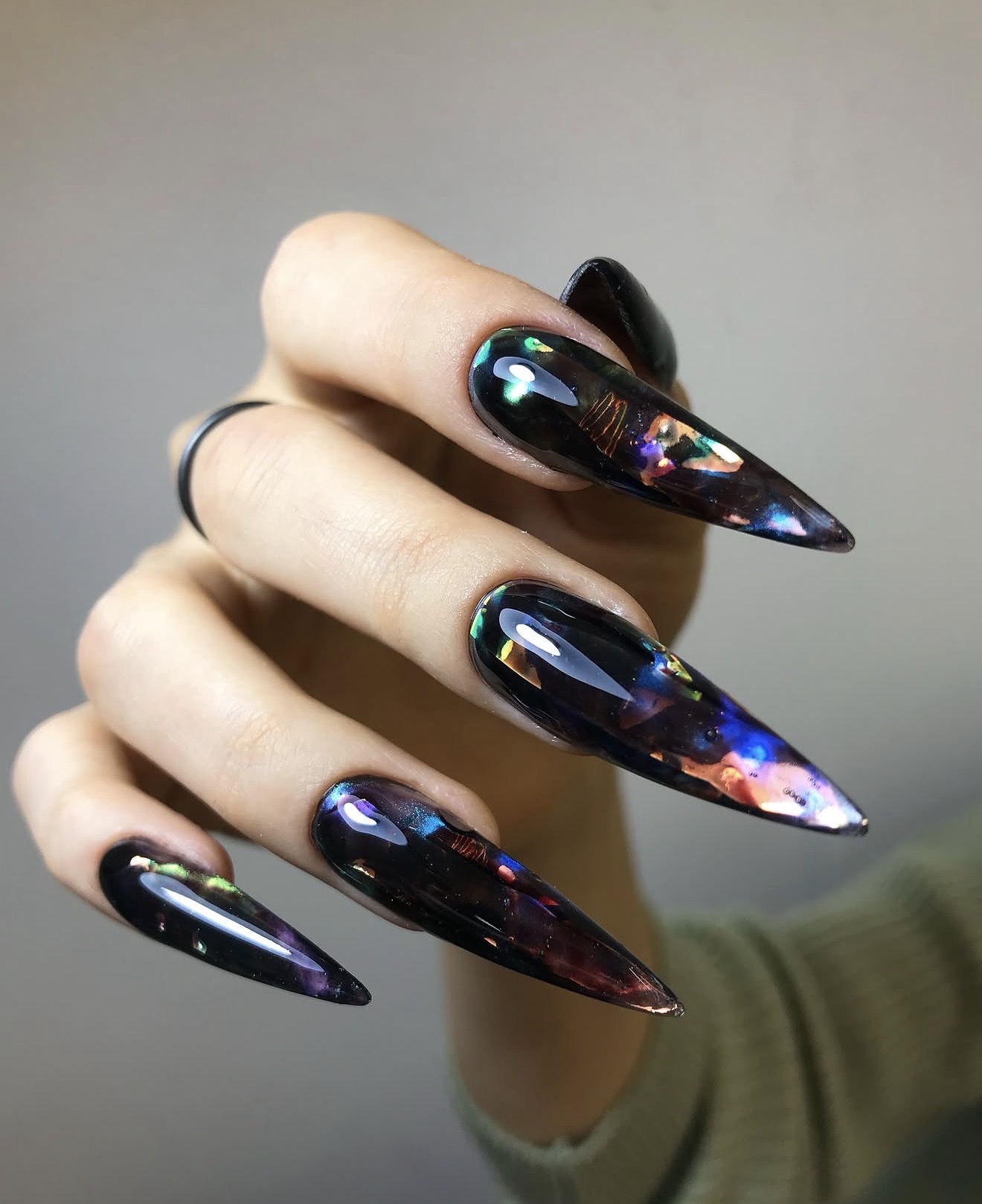 Dark Iridescent Stiletto Nails with Chrome Accents