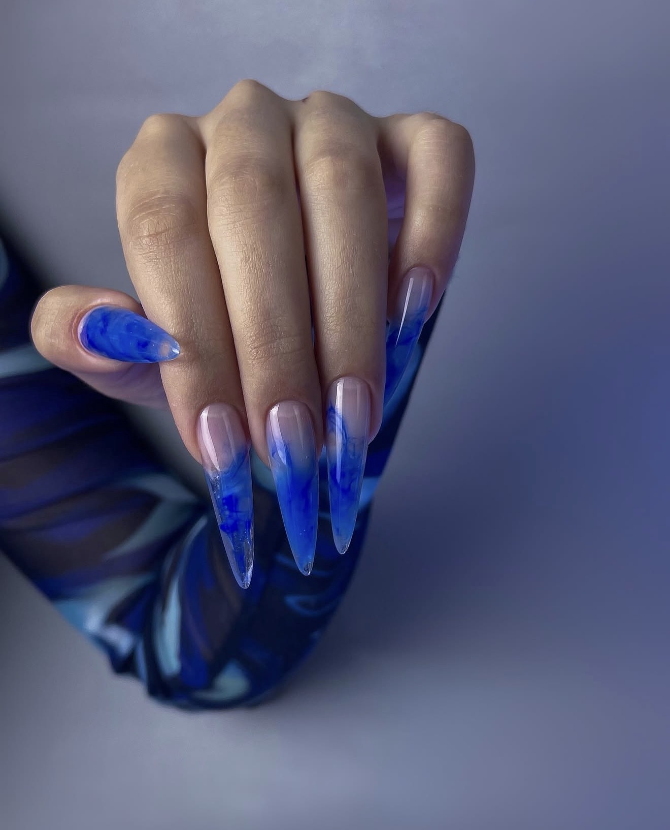 Electric Blue Swirl Marble Stiletto Nails