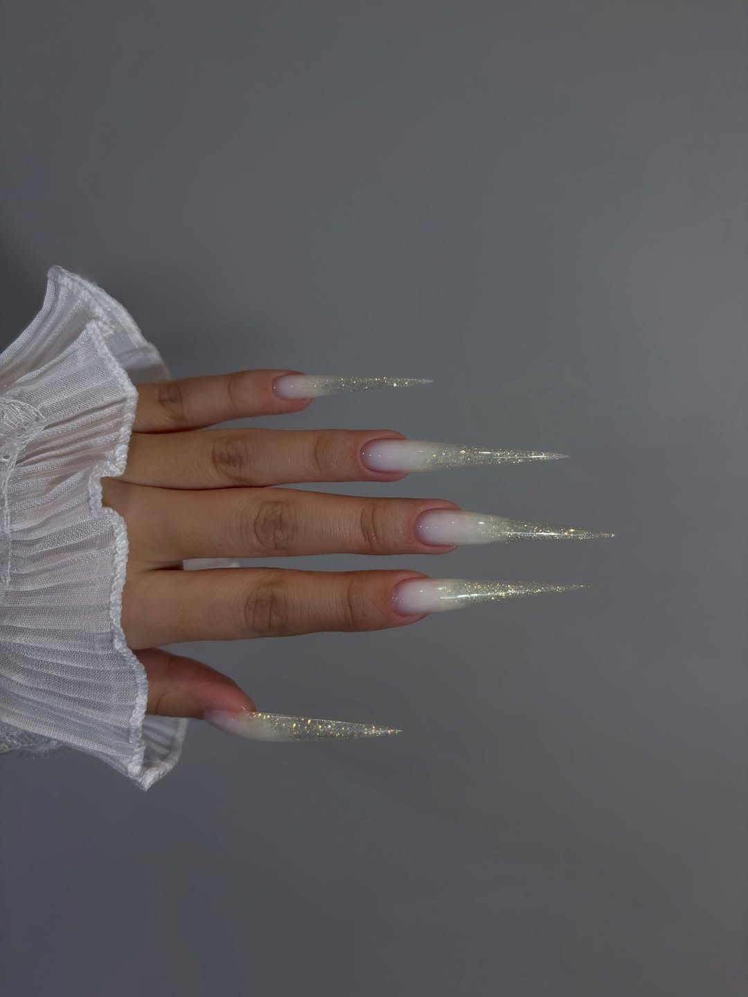 Glitter Ombre Stiletto Nails With Milky White Base