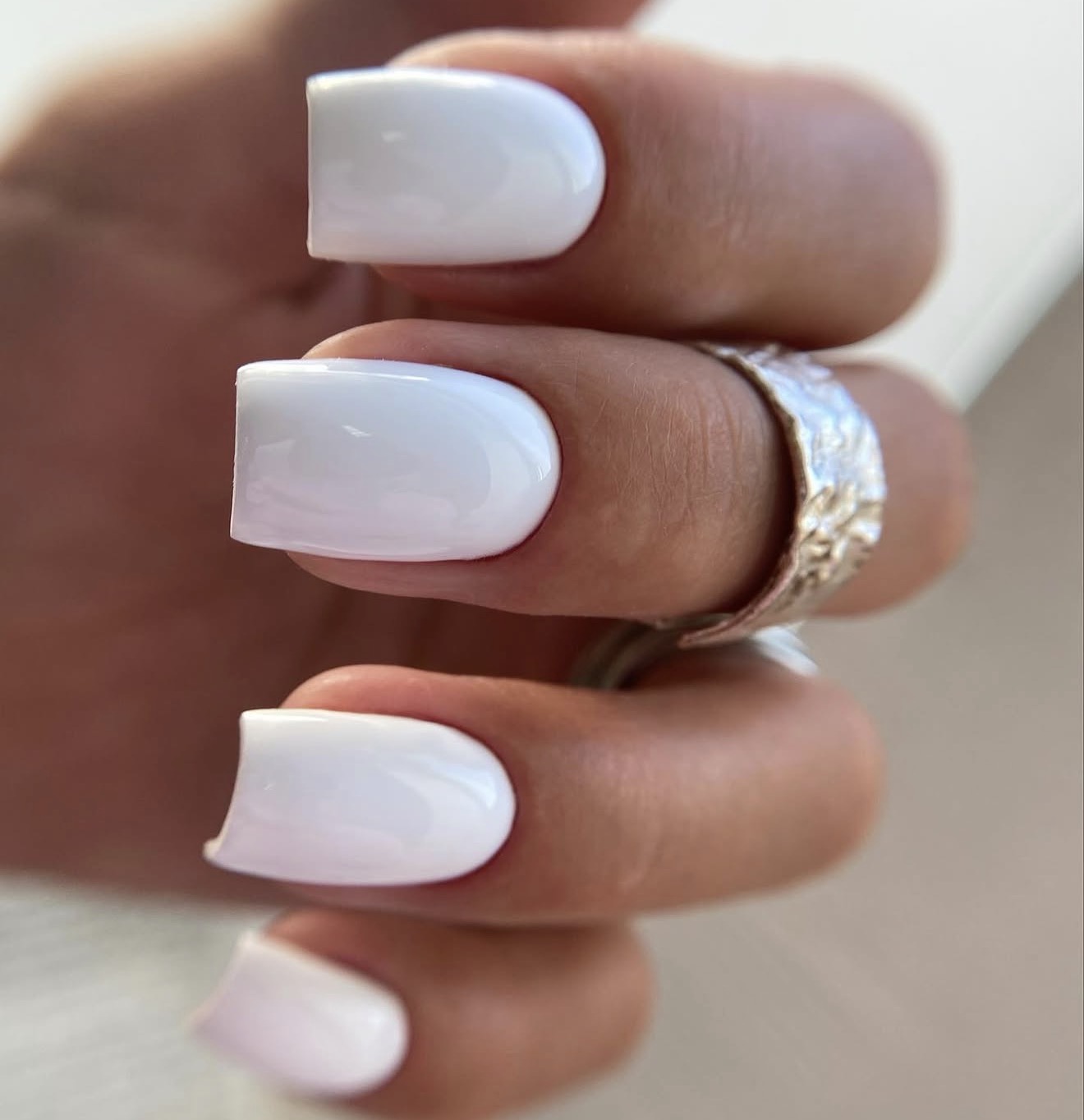 Glossy White Square Nails With A Subtle Sheen