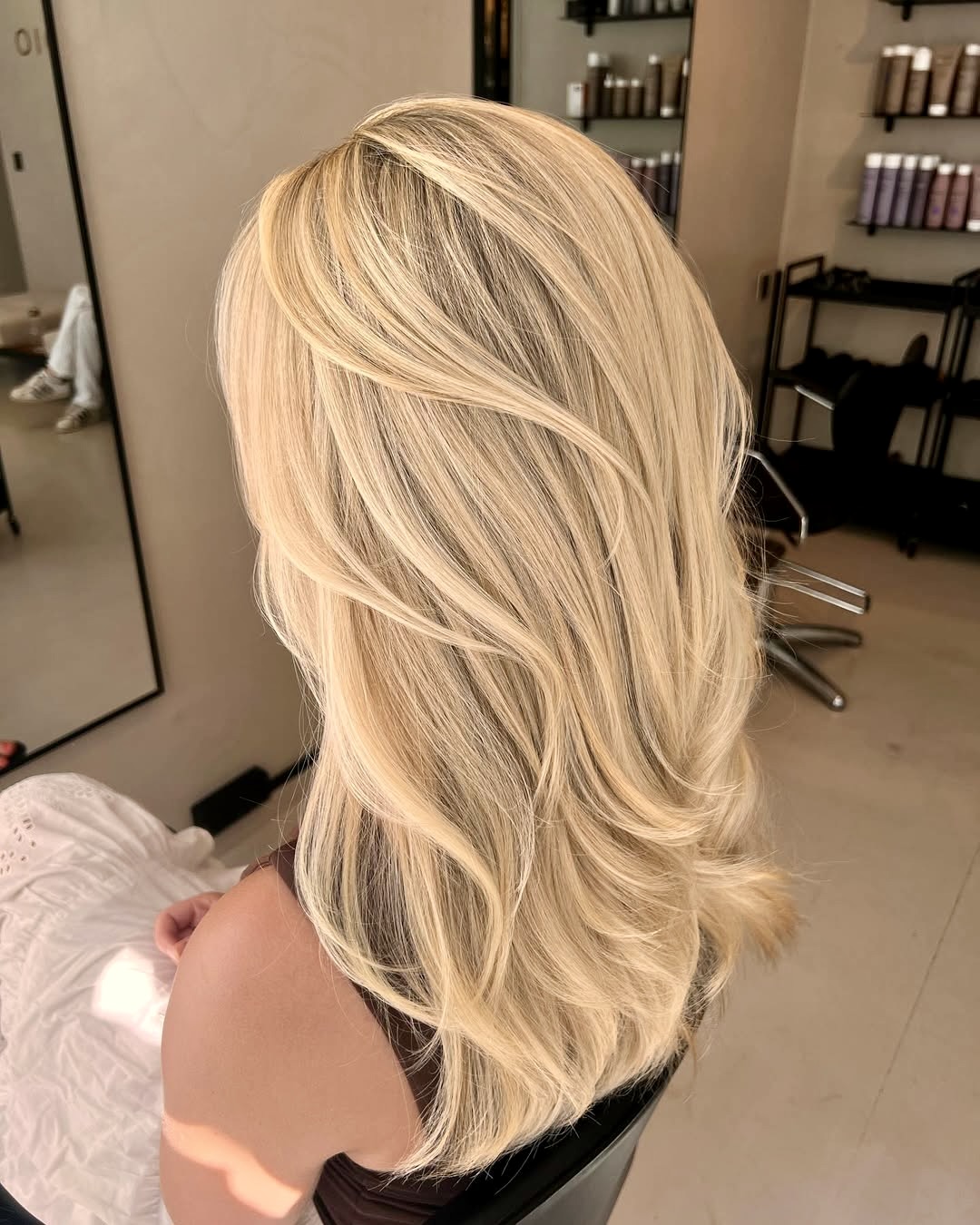 Golden Blonde Layered Hair With Invisible Highlights