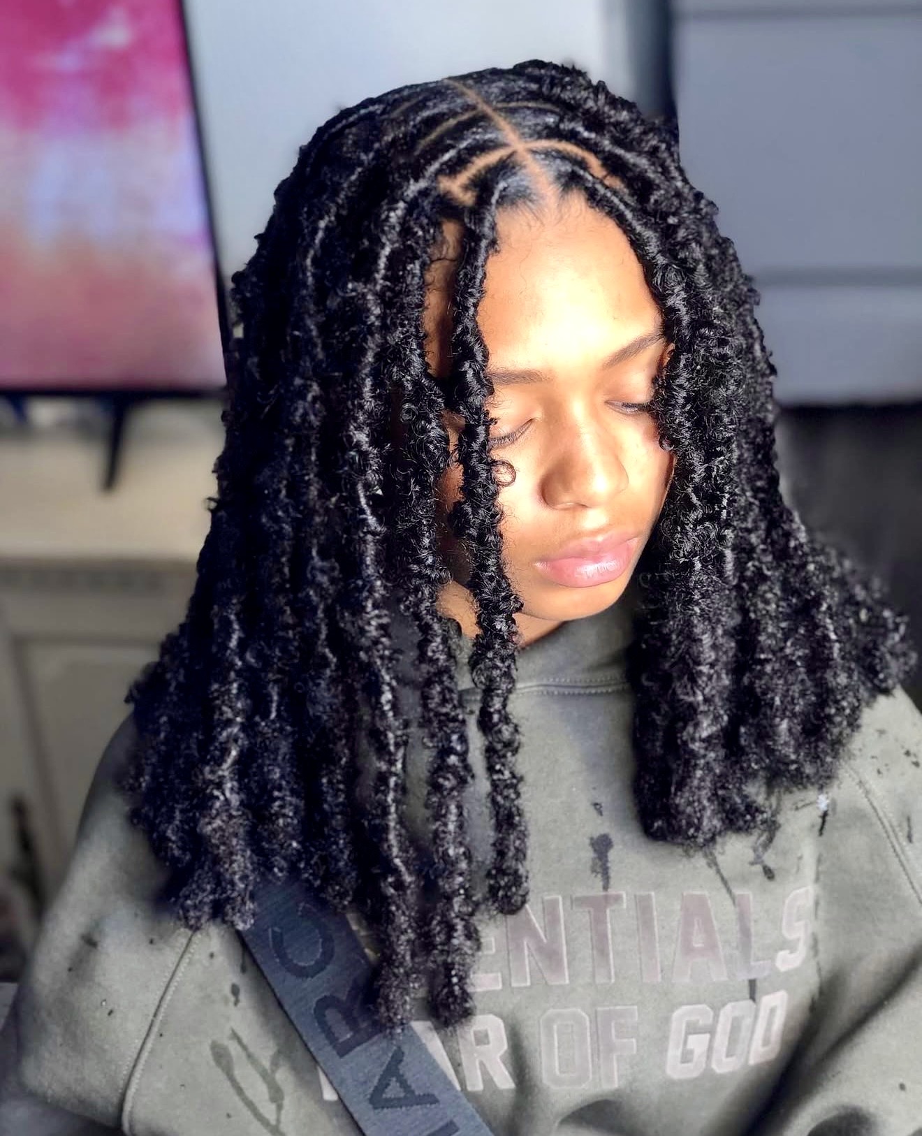 Medium Length Butterfly Locs With Defined Curls