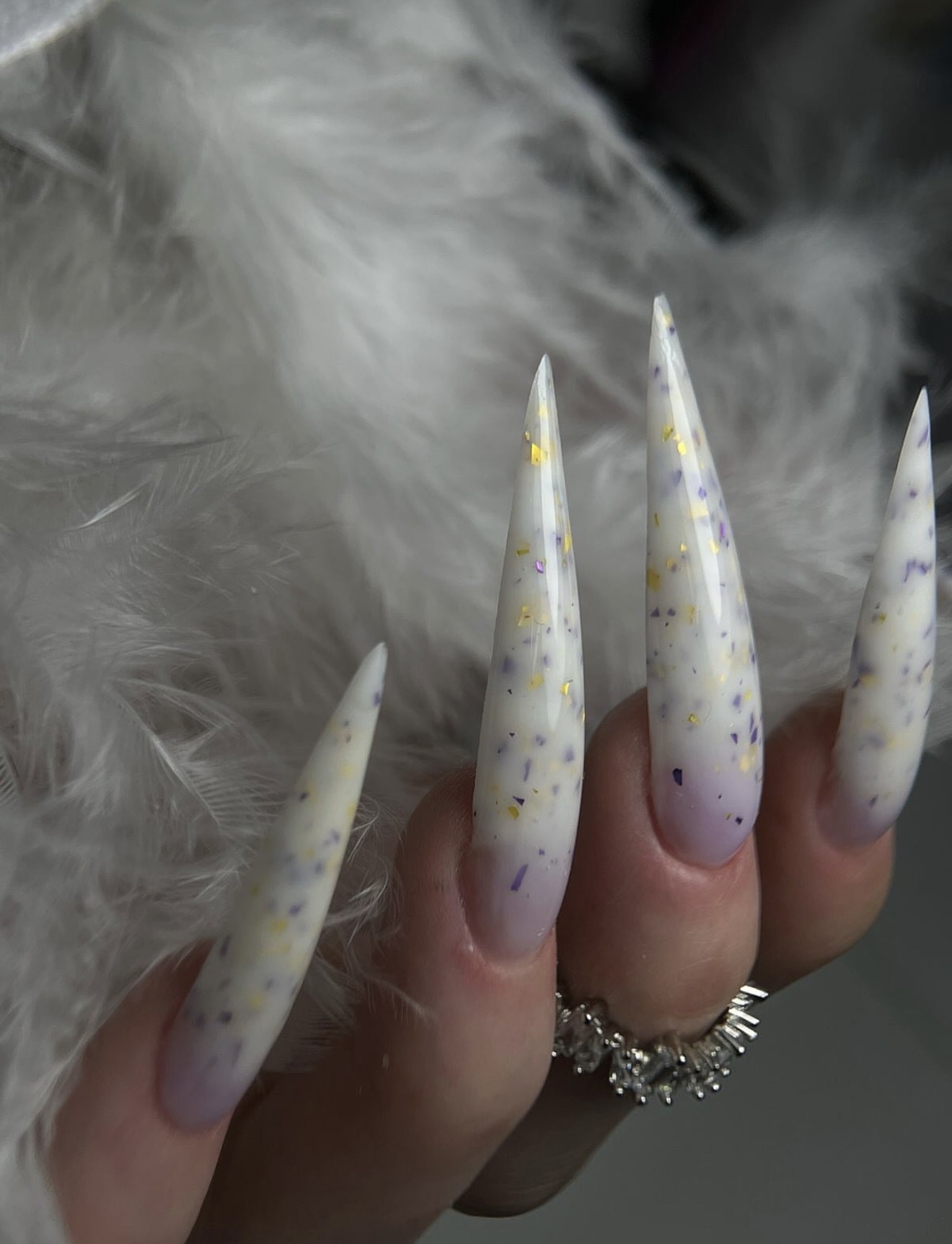 Milky Stiletto Nails with Purple & Gold Flakes