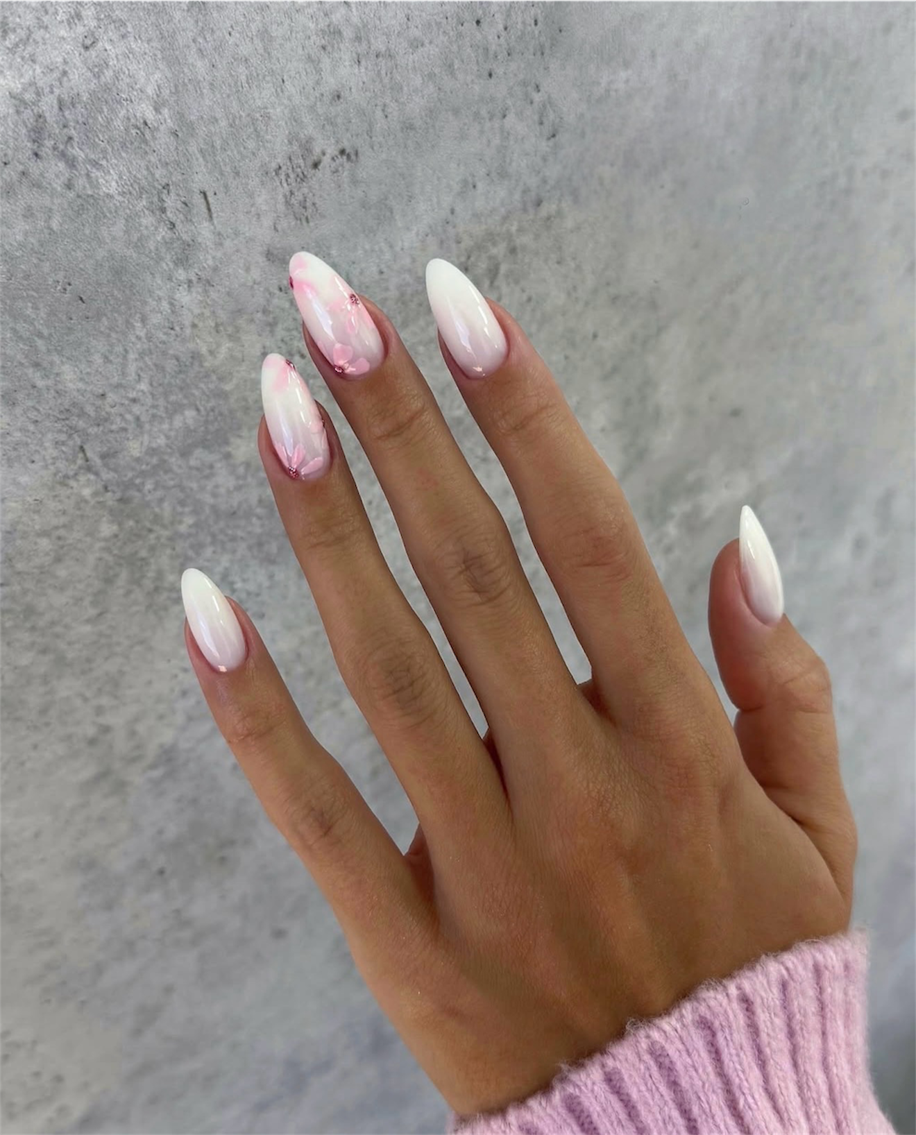 Milky White Almond Nails with Pink Floral Accents