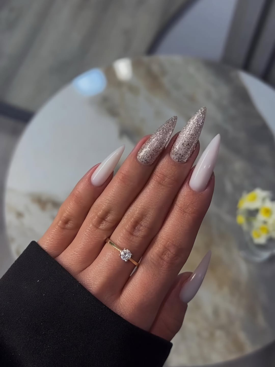 Milky White and Silver Glitter Stiletto Nails
