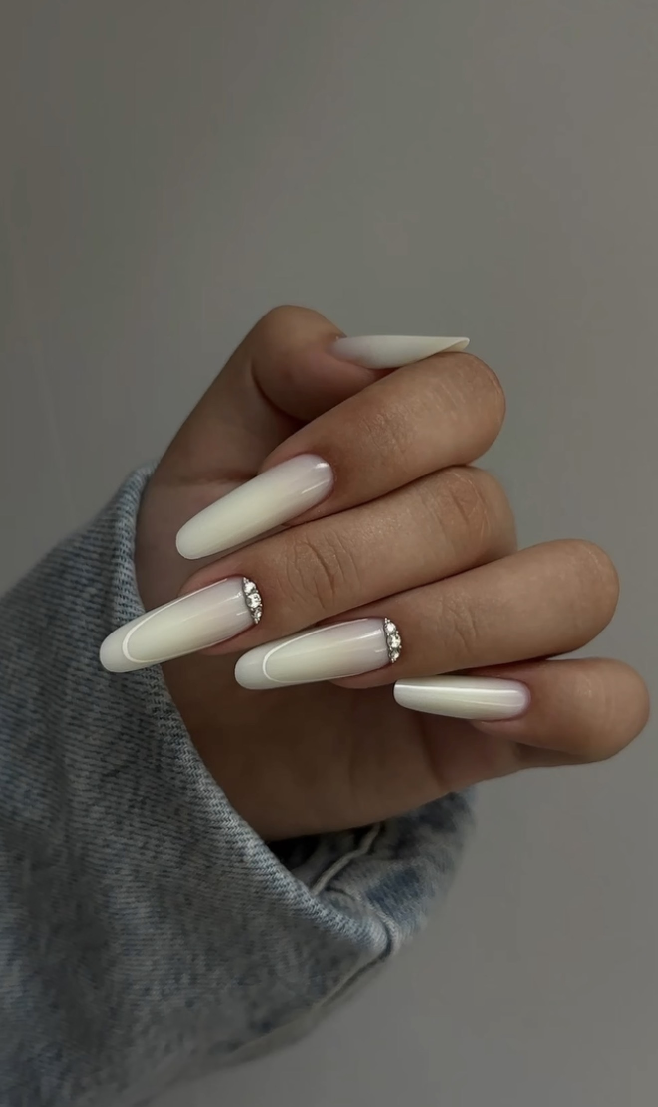 Milky White Aura Ombré Almond Nails with Crystal Accent