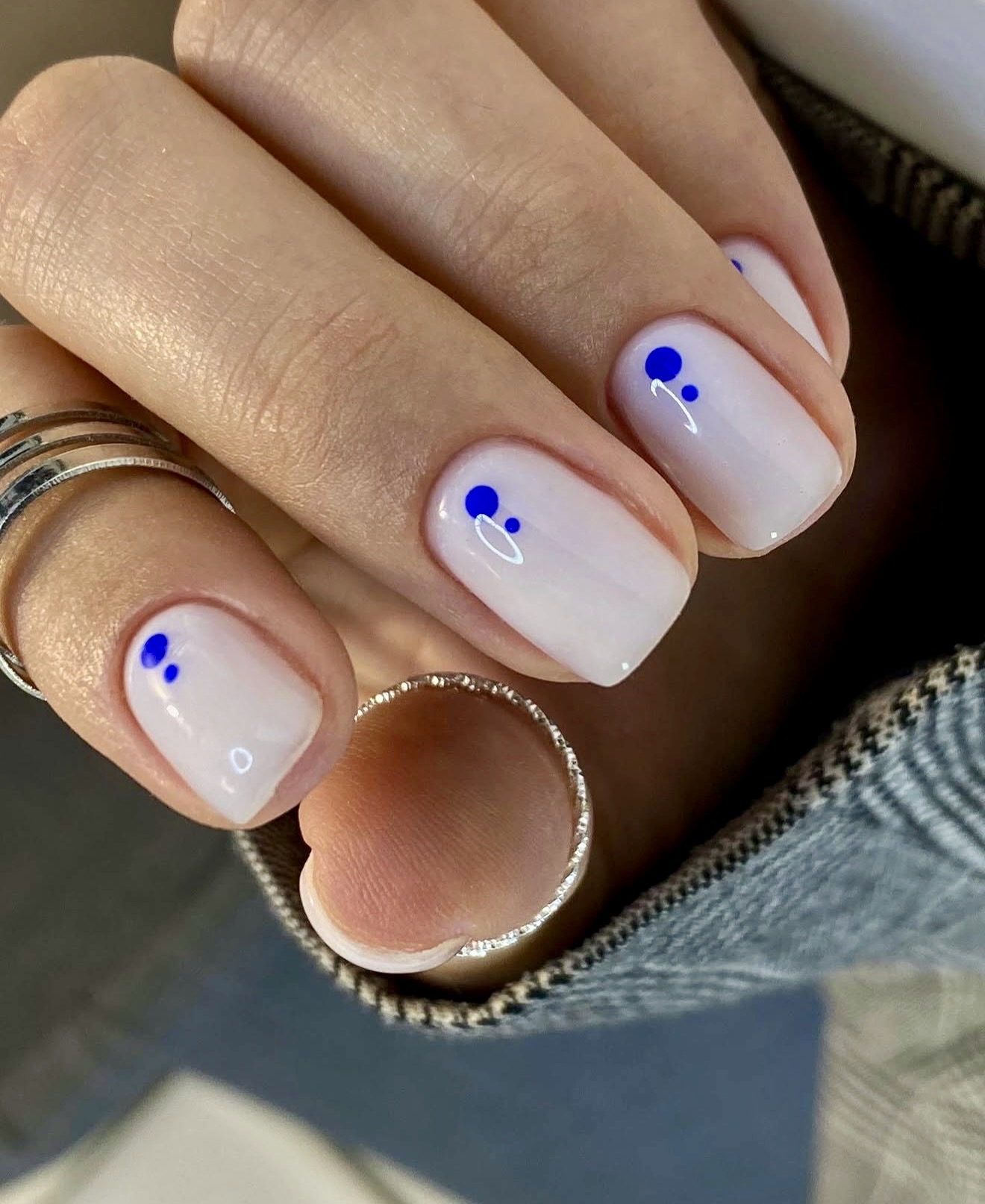 Milky White Base with Minimal Blue Dot Accents