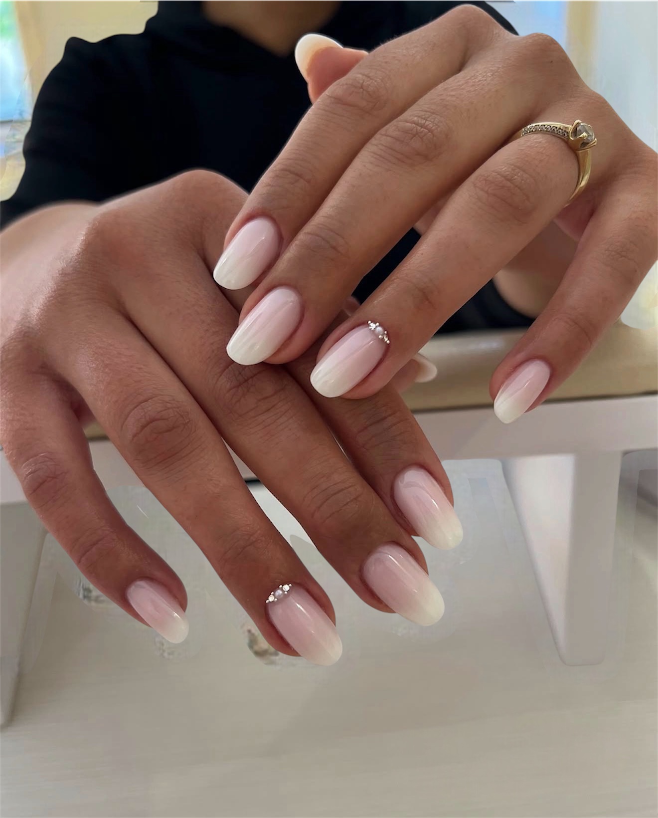 Milky White Ombre Oval Nails with Jewel Accent