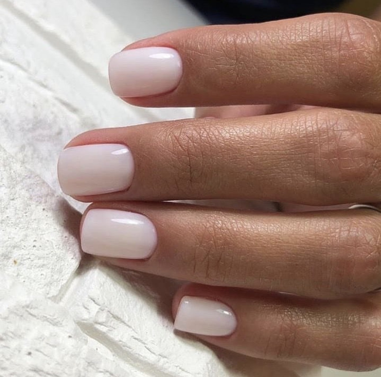 Milky White Squoval Nails With High Gloss Finish
