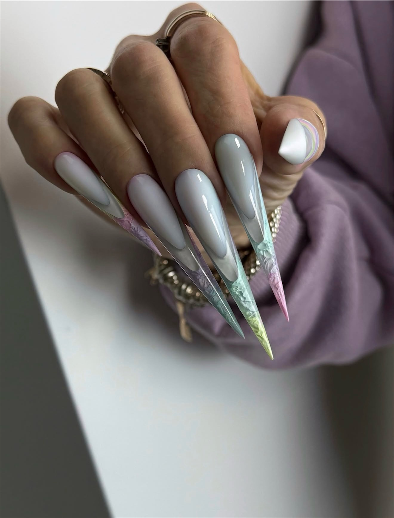 Milky White Stiletto Nails with Pastel Ombre Tips