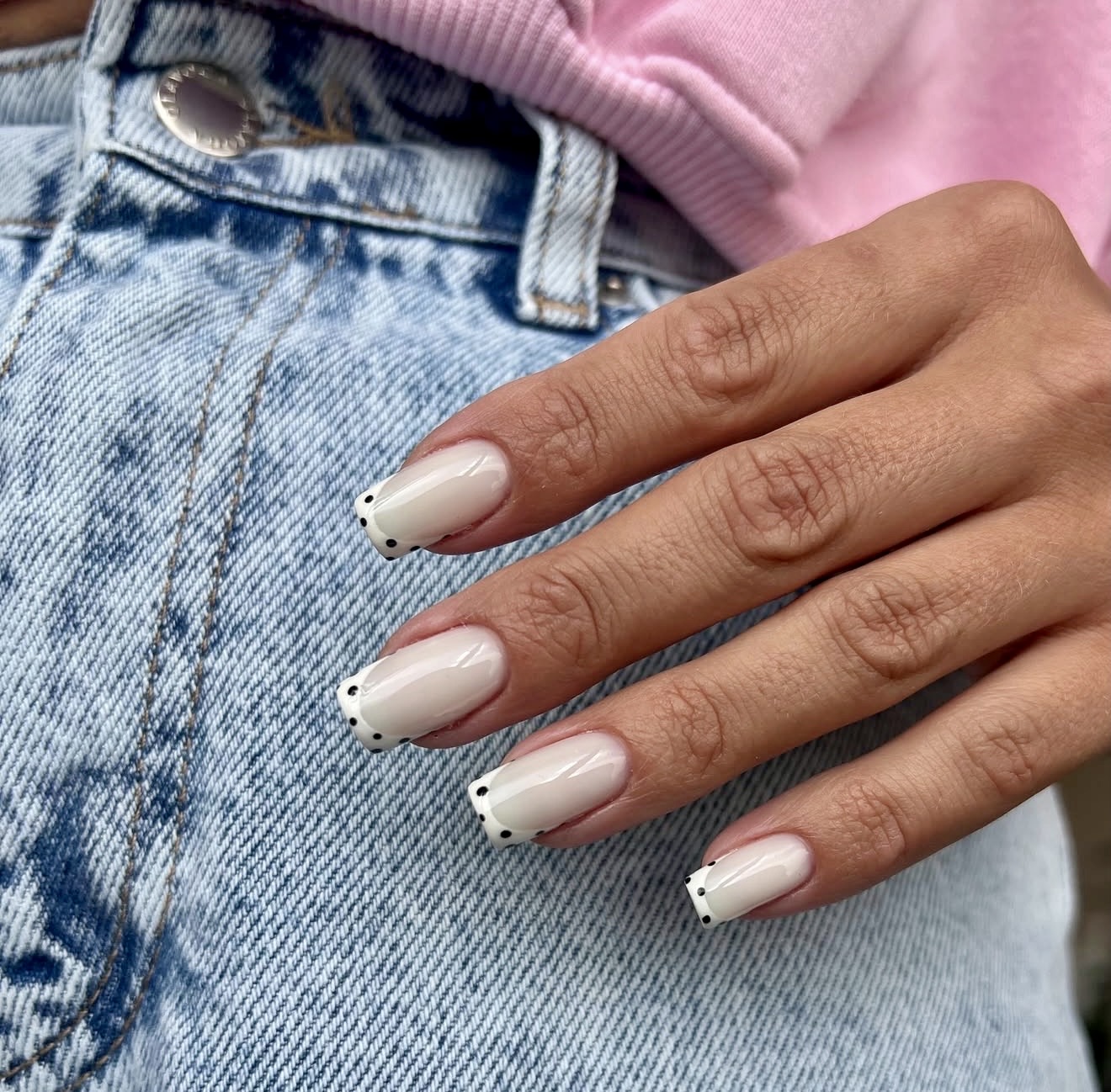 Modern French Tip Nails with Black Polka Dots