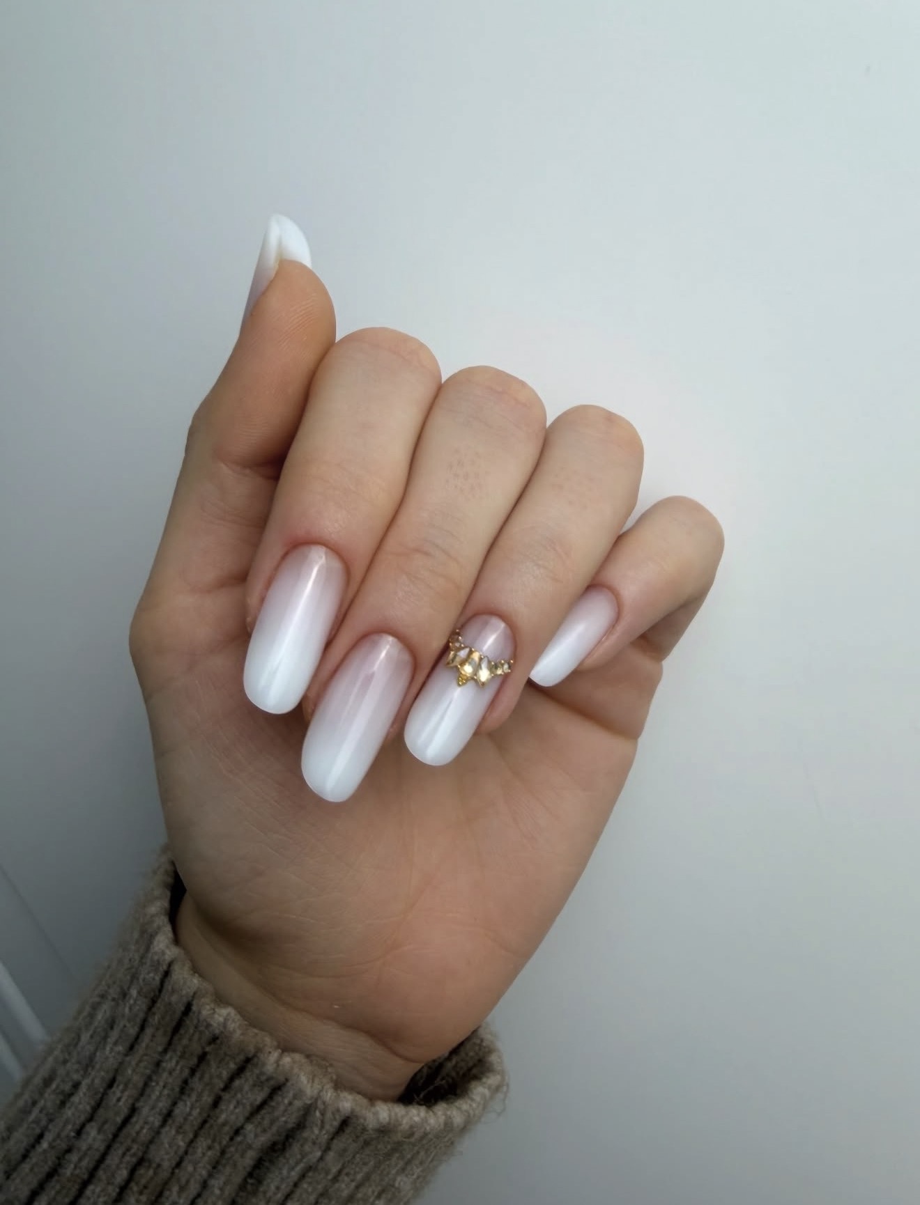 Ombre Pearl White Almond Nails with Rhinestone Accent