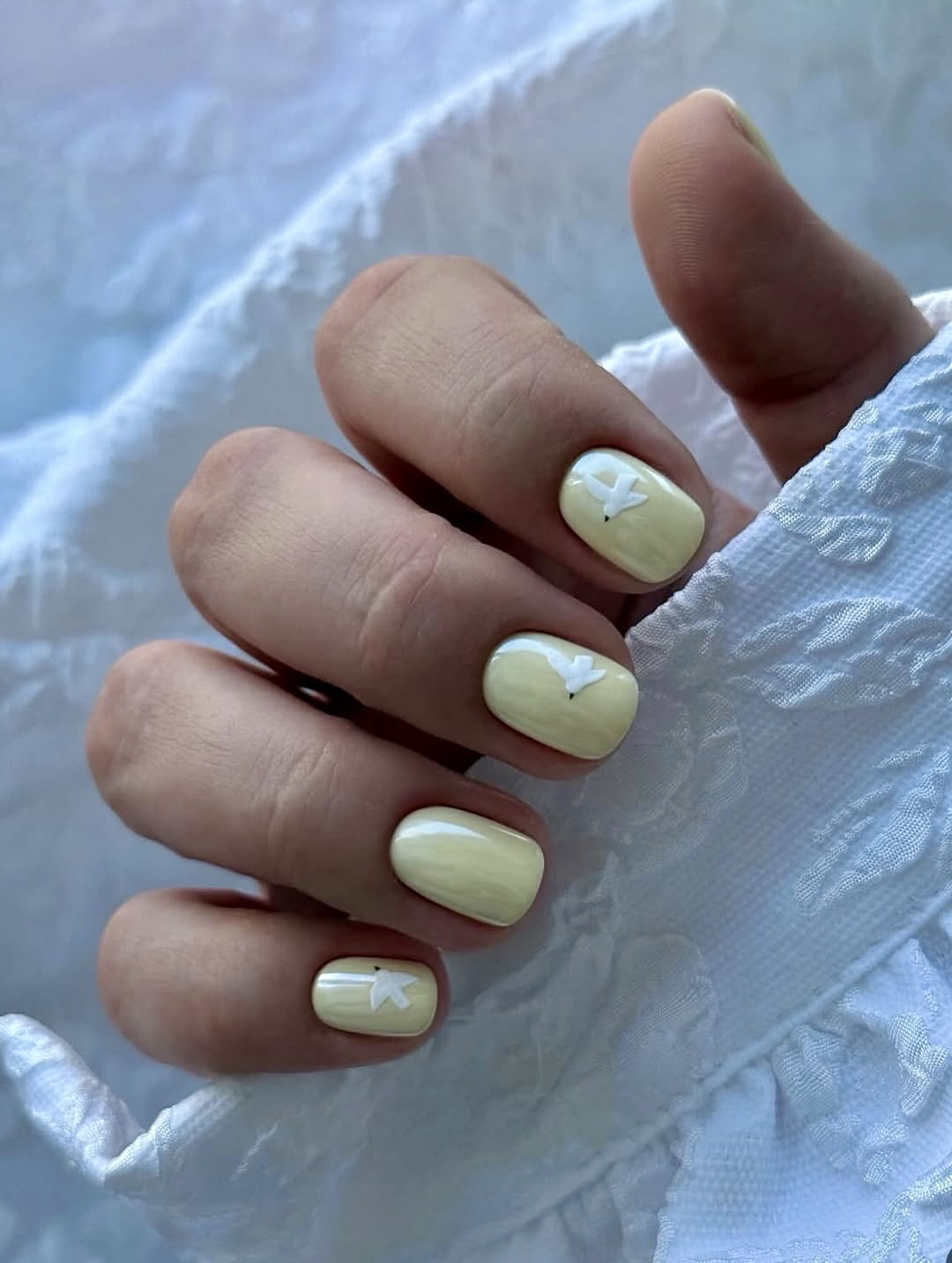 Pale Yellow Short Nails with White Bird Decals