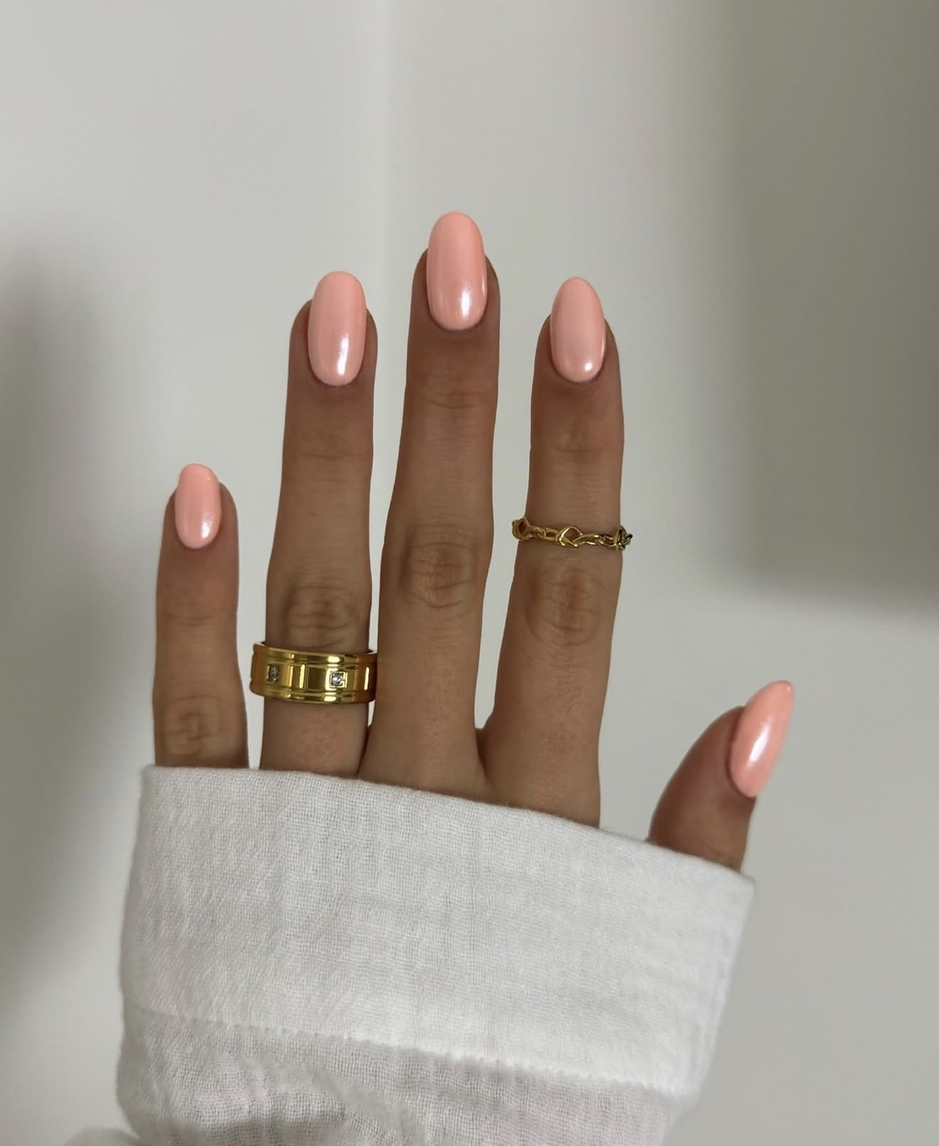 Peachy Pink Oval Chrome Nails