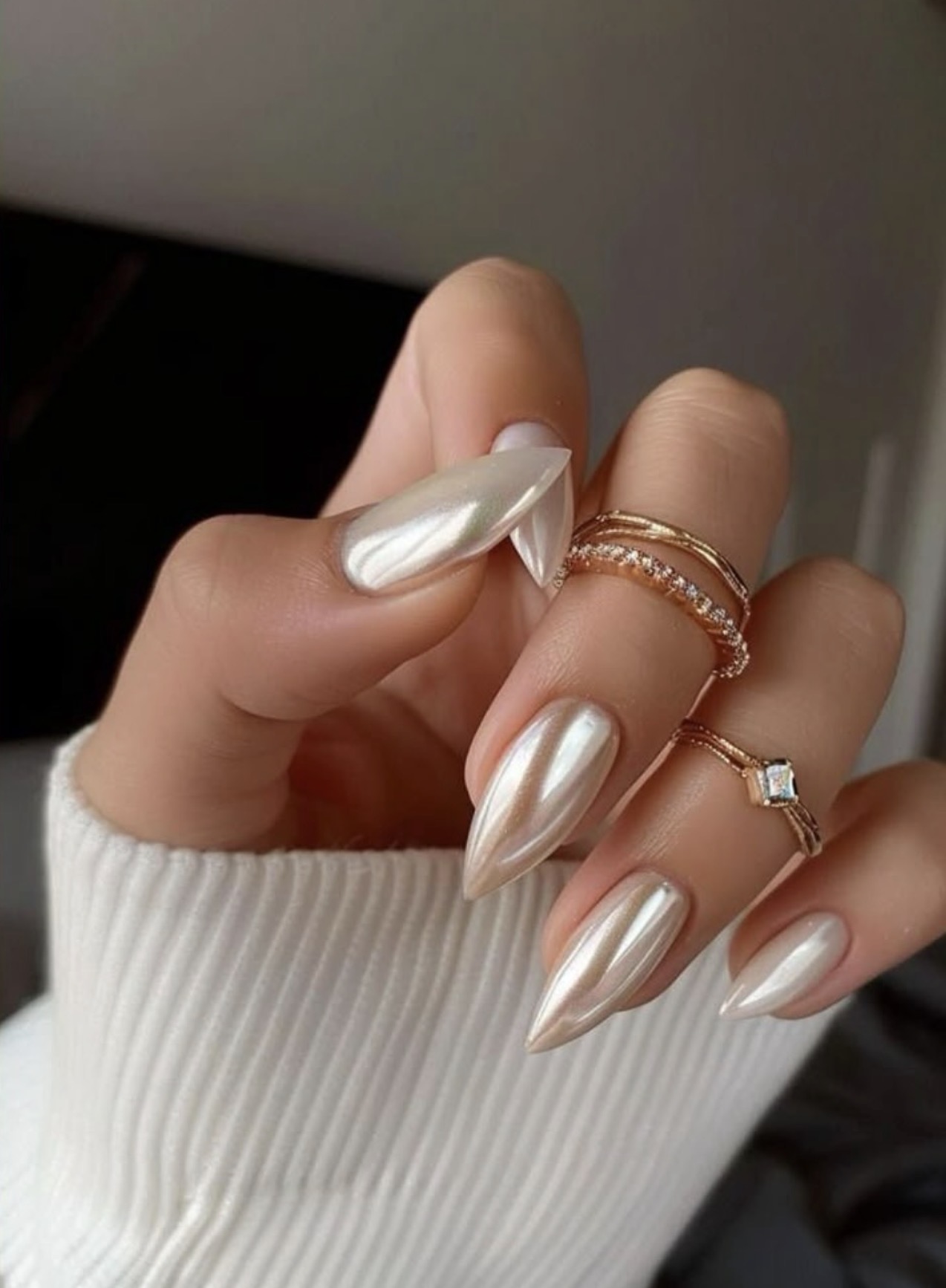 Pearl Chrome Almond Nails with Subtle Shimmer