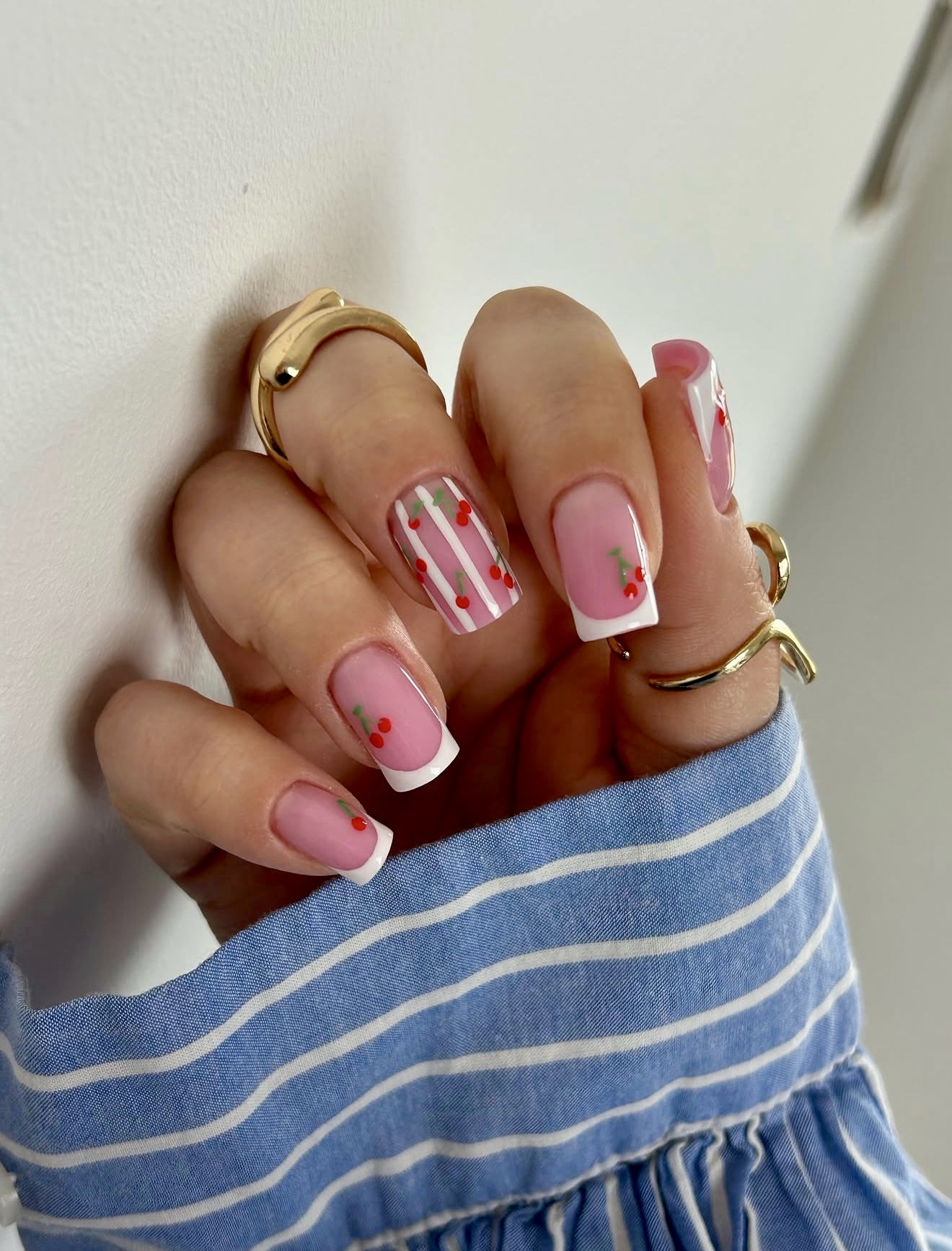 Pink French Tips with Cherry Accents