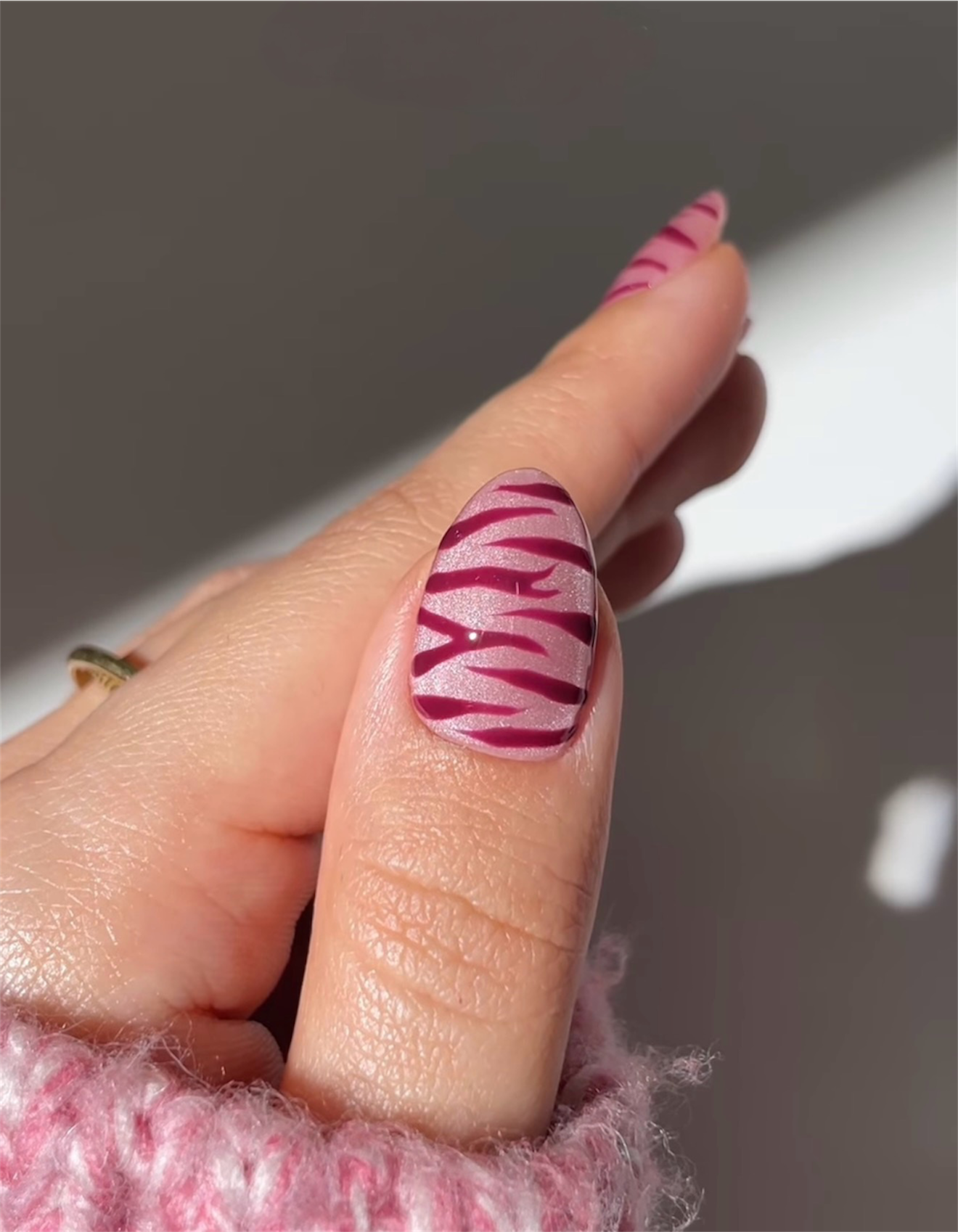 Pink Shimmer Tiger Stripe Cat Eye Nails