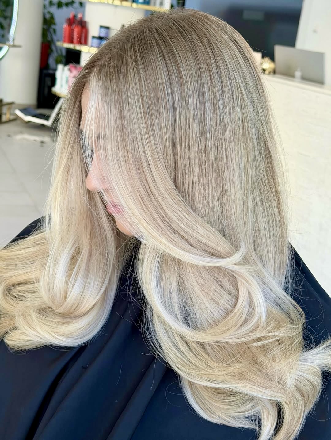 Platinum Blonde Mid-Length Cut With Wavy Ends