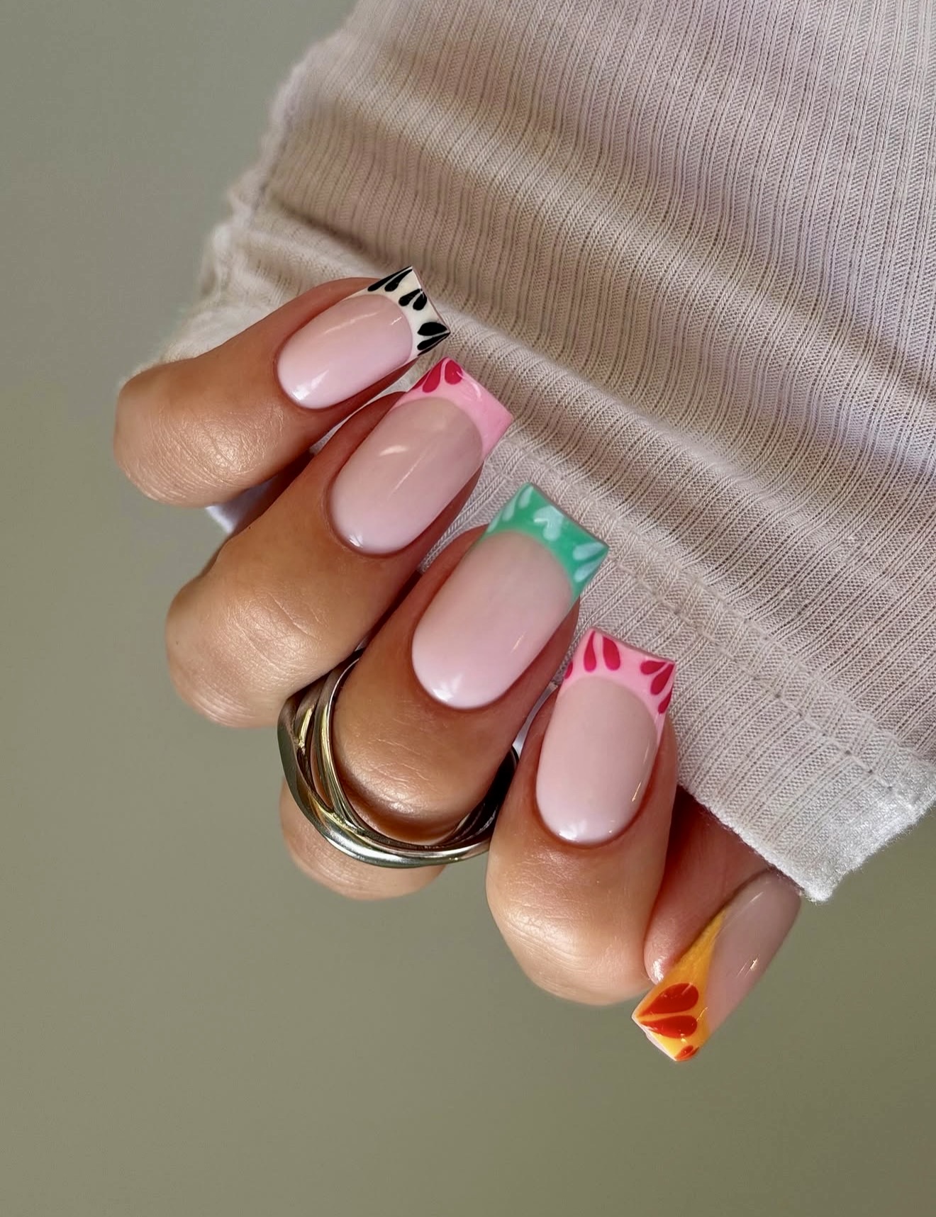 Playful French Tips with Mixed Cartoon Motifs