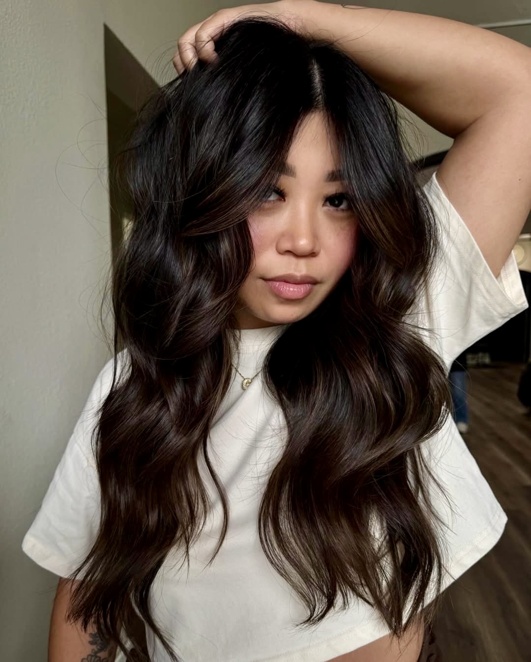 Rich Brunette Waves With Face-Framing Layers