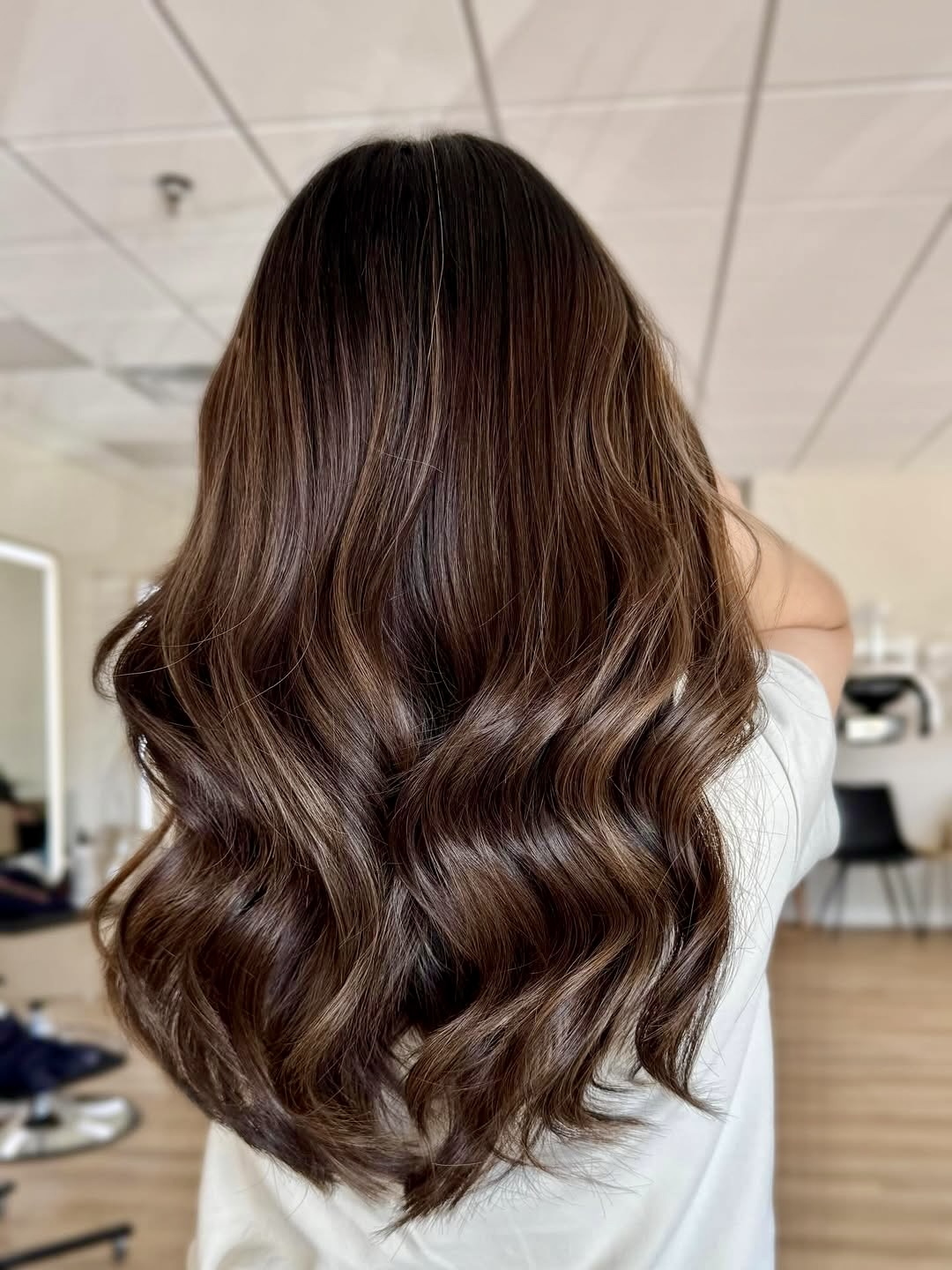 Rich Brunette Waves With Subtle Caramel Highlights