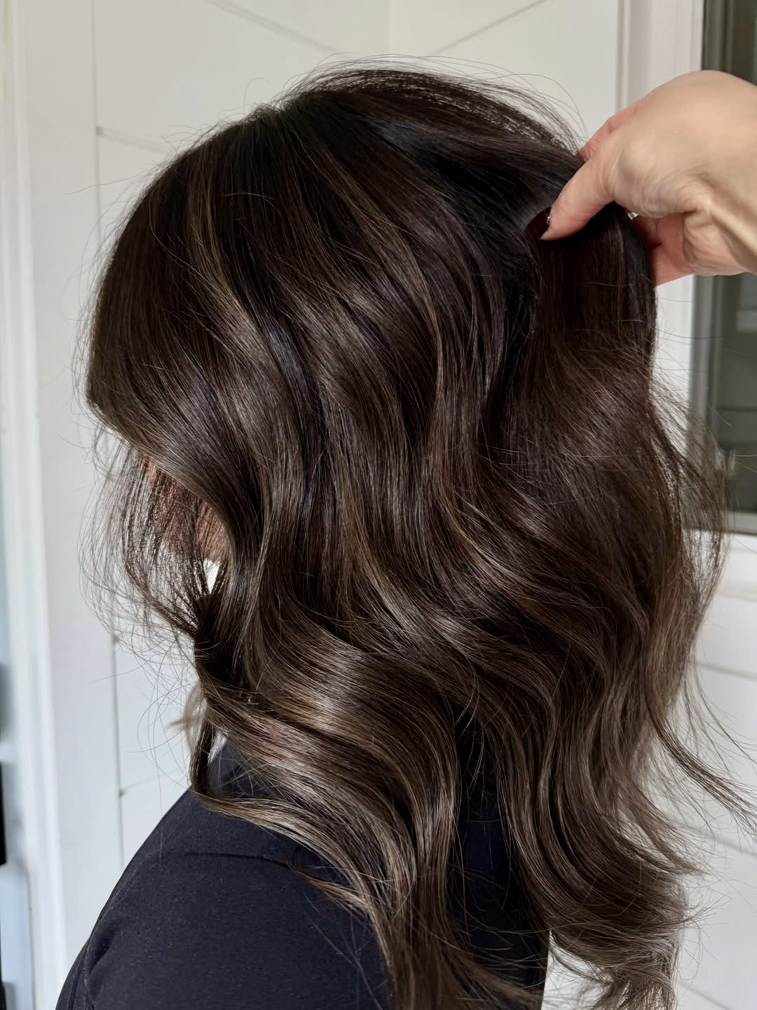 Rich Brunette With Greige Highlights And Soft Waves