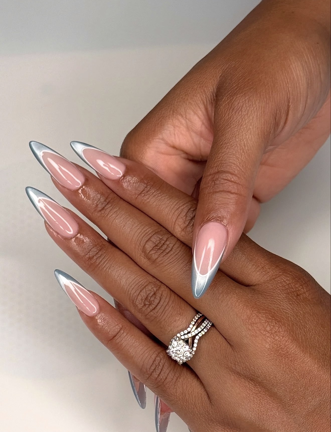 Sleek Silver Tip French Stiletto Nails