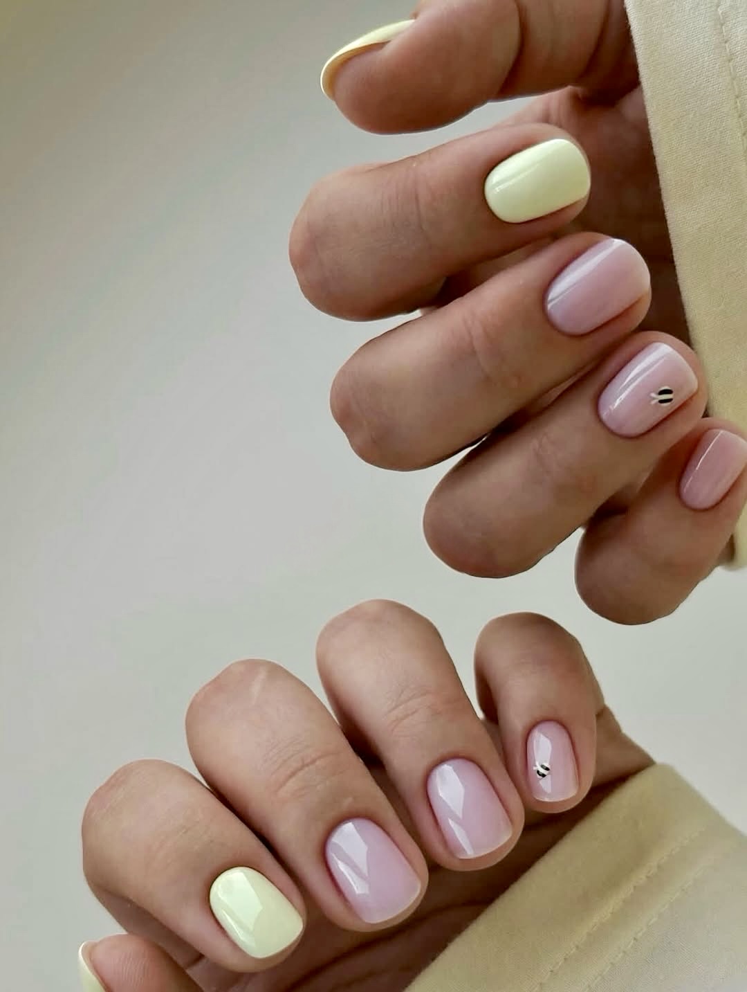 Soft Pastel Mismatched French Tips with Minimalist Accent