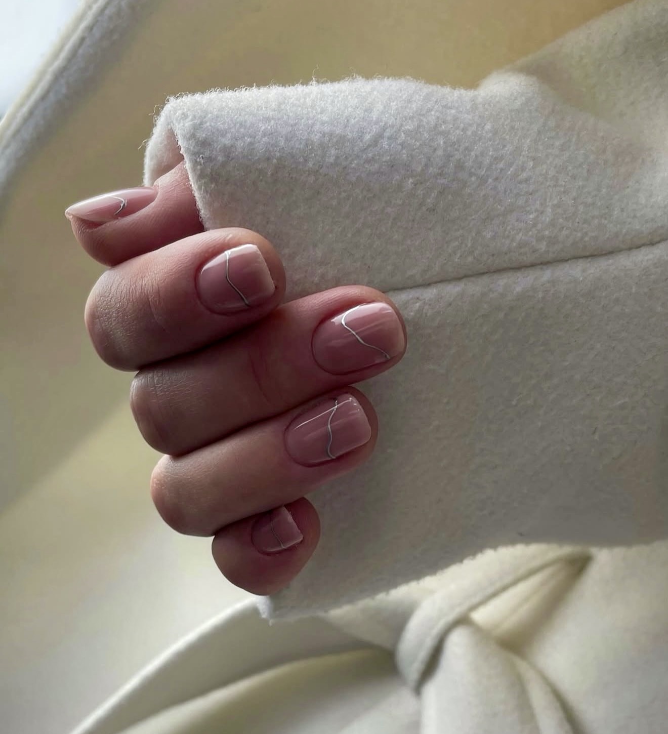 Soft Pink Milky Nails with Silver Wavy Lines