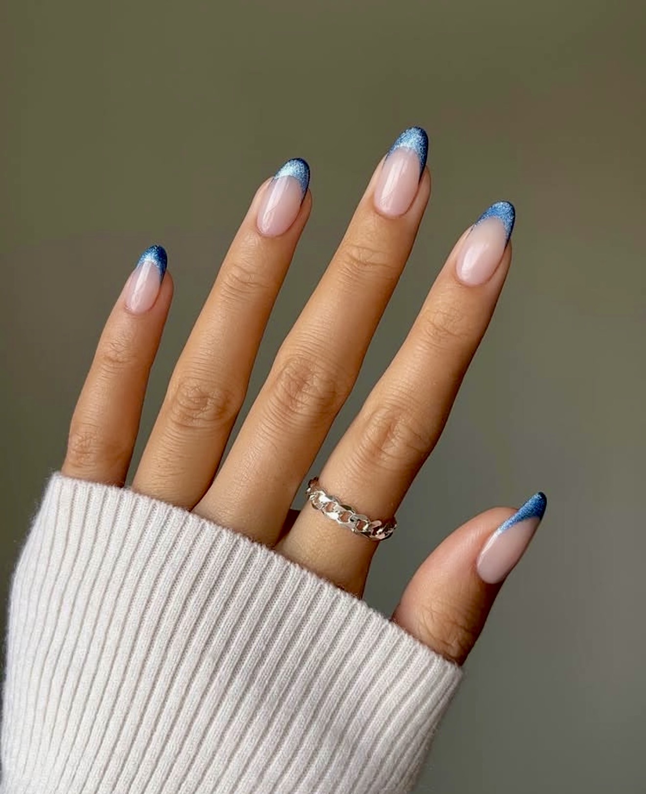 Sparkling Blue Tip Almond French Nails