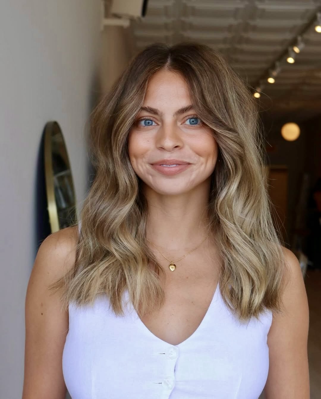 Sun-Kissed Bronde Waves With Face-Framing Layers