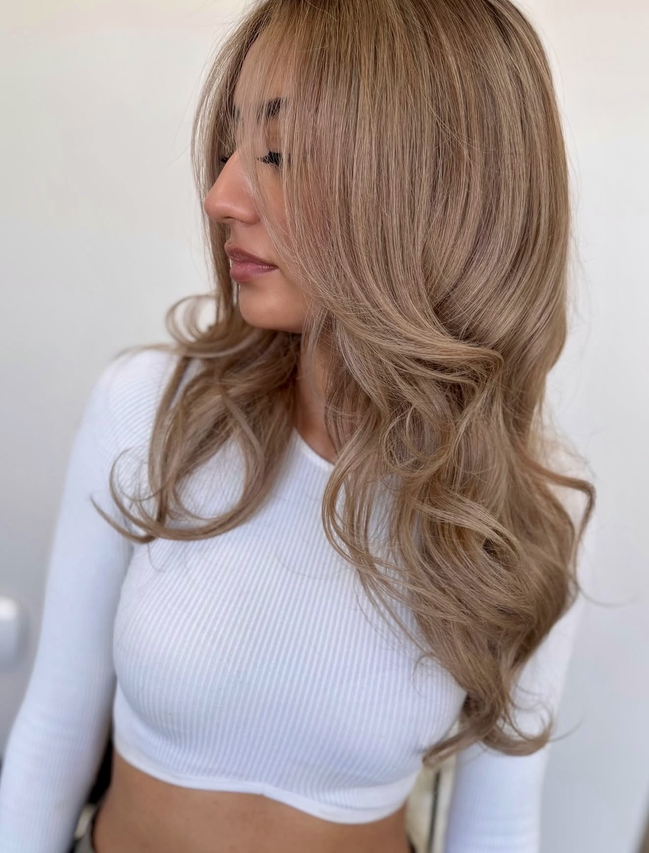 Warm Ash Blonde Beach Waves With Face Framing