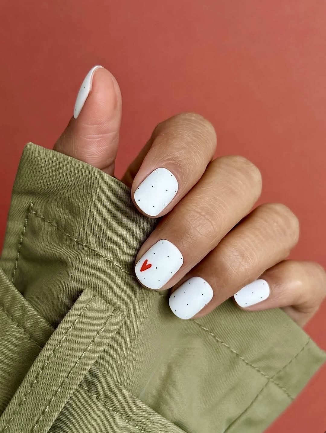 White Matte Nails with Black Dots and Red Heart Accent