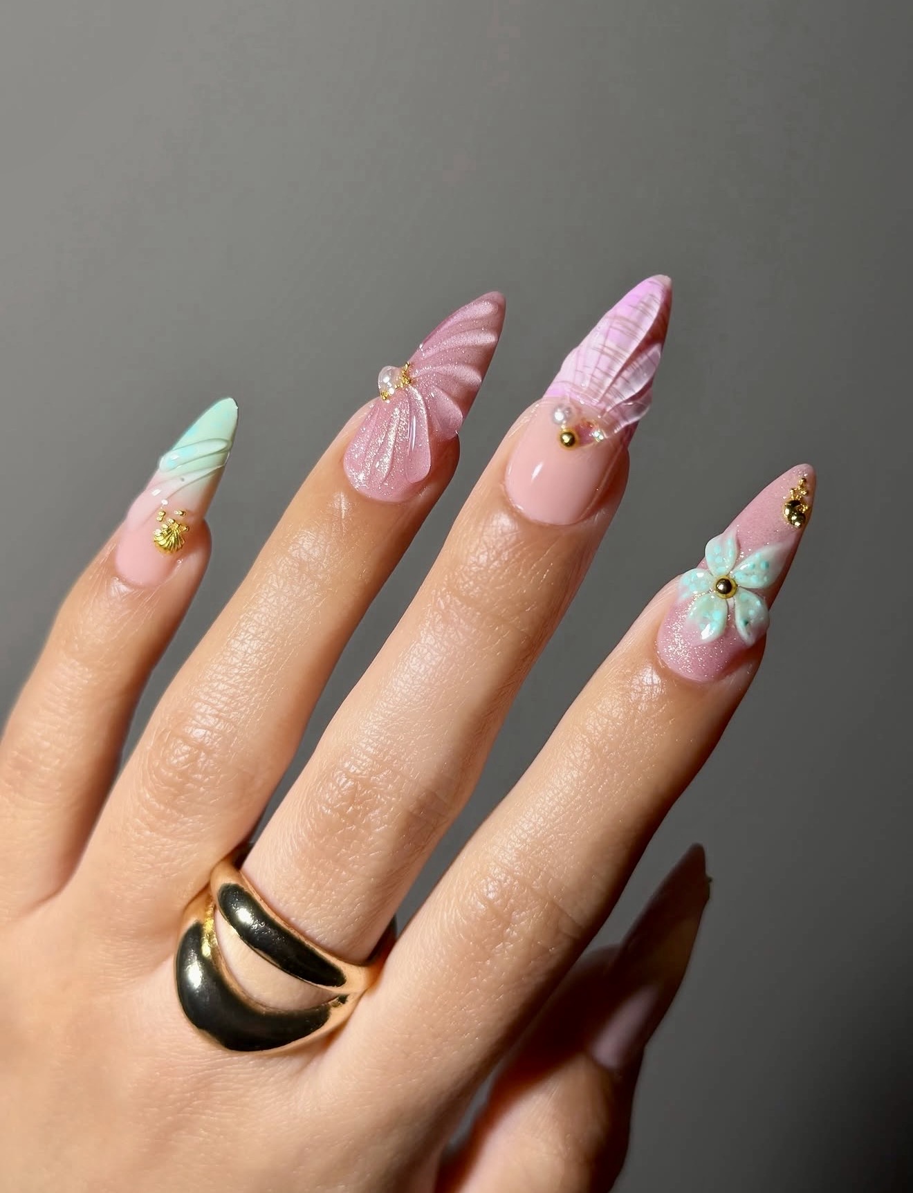 3D Shell and Flower Accented Stiletto Nails