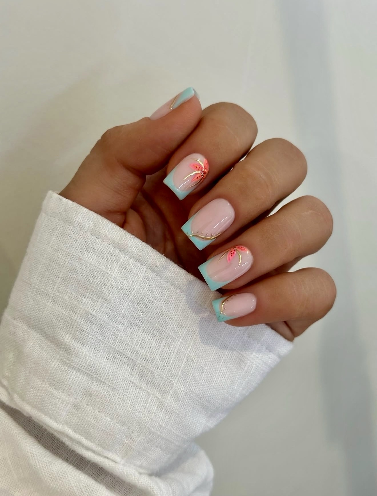 Aqua French Tip Floral Nail Art Design