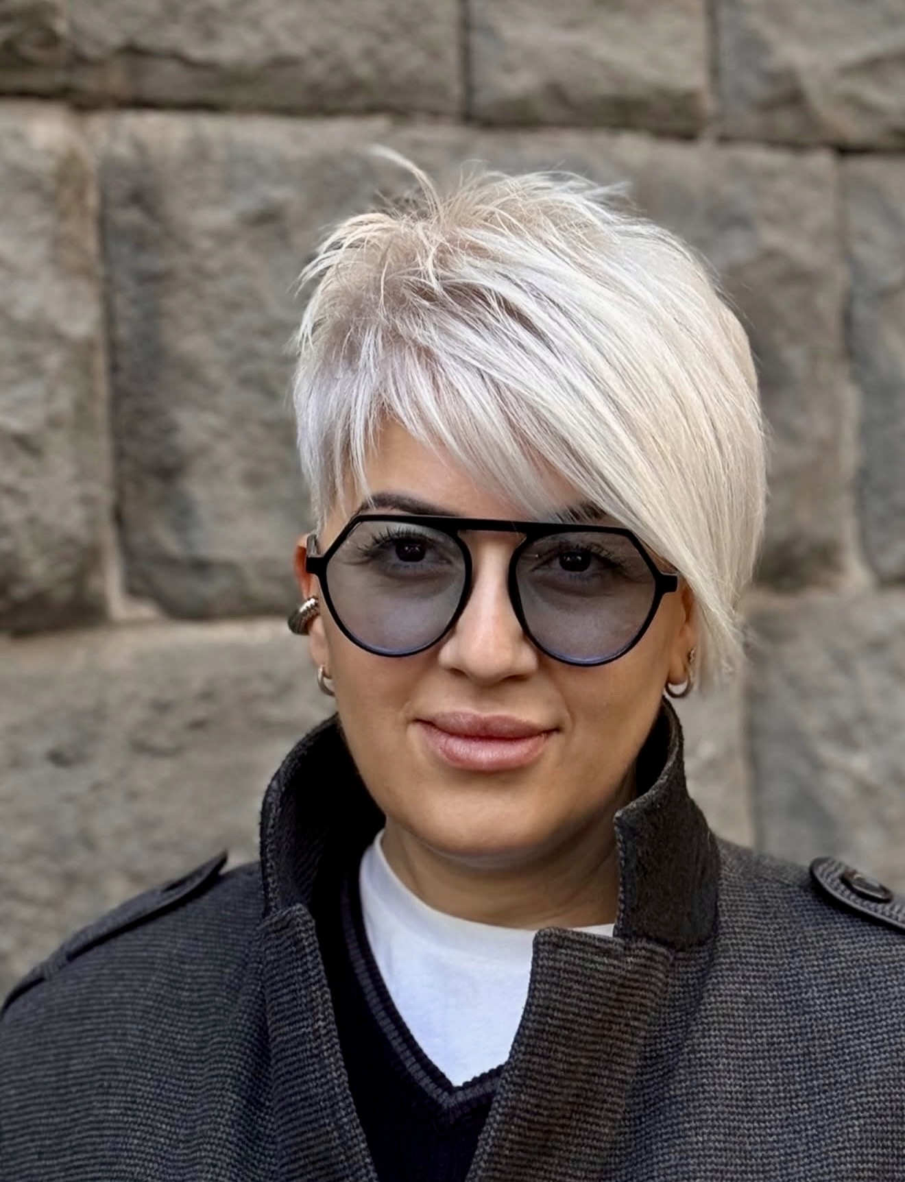 Asymmetrical Platinum Blonde Pixie With Textured Top