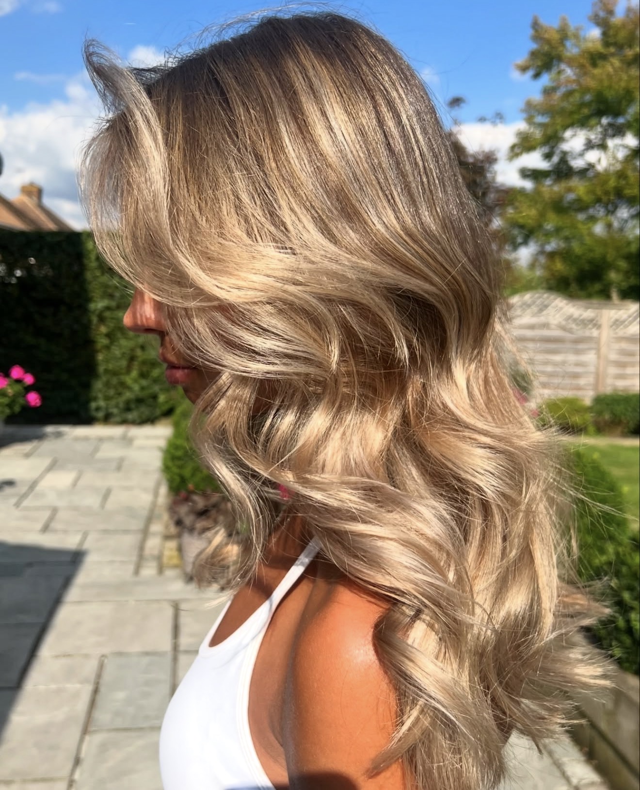 Beachy Blonde Balayage With Soft Face Framing