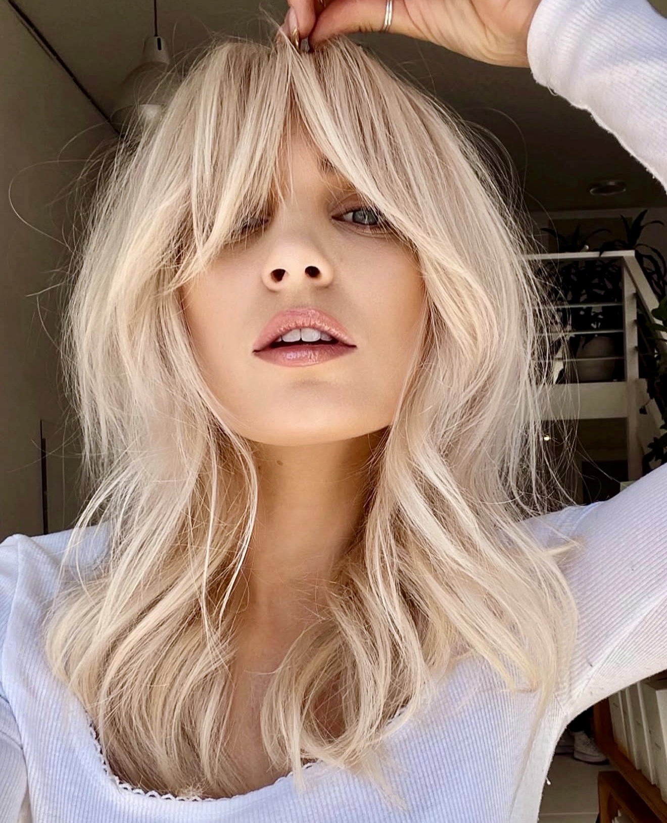 Beachy Blonde Shag With Wispy Curtain Bangs