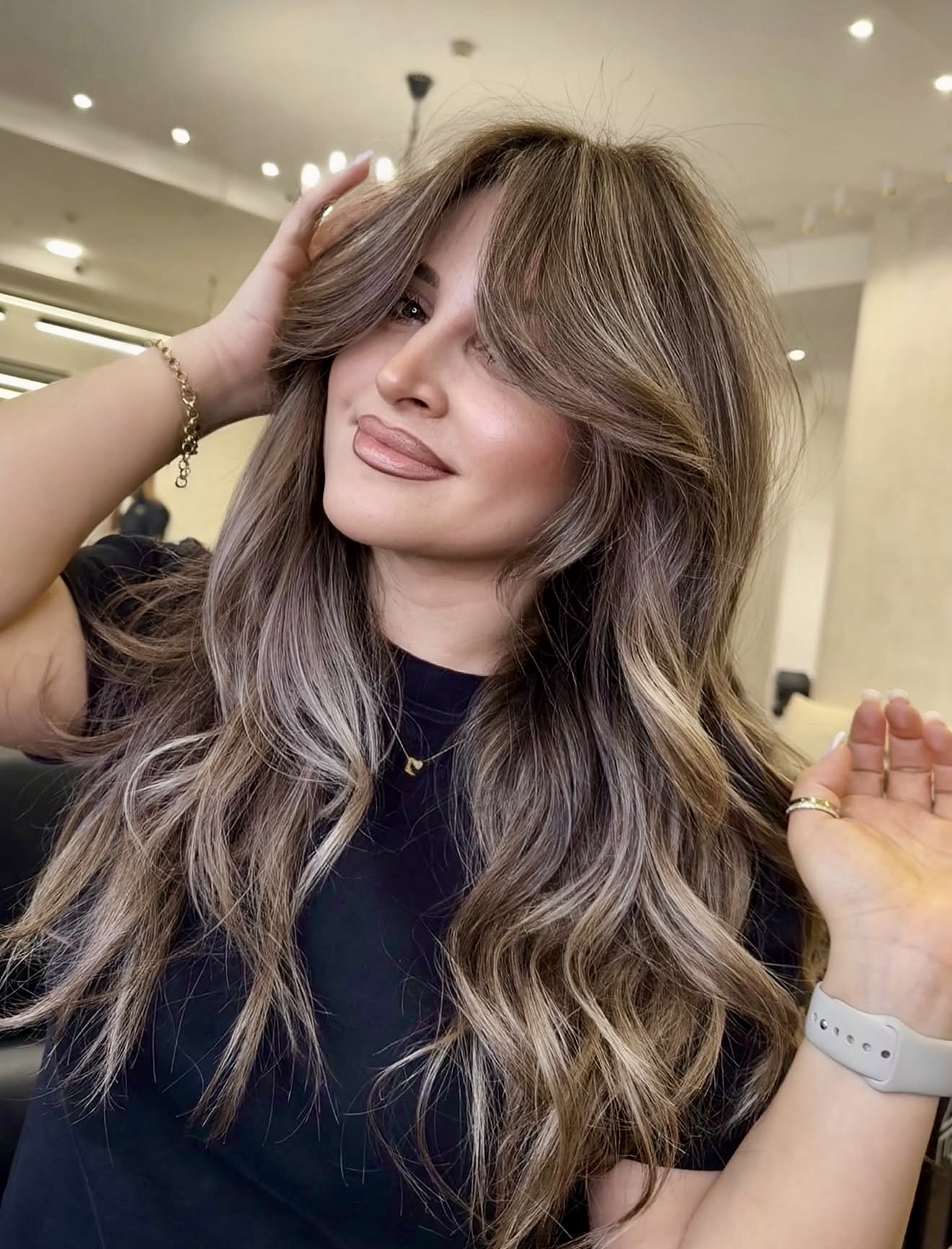 Beachy Bronde Waves With Face-Framing Layers