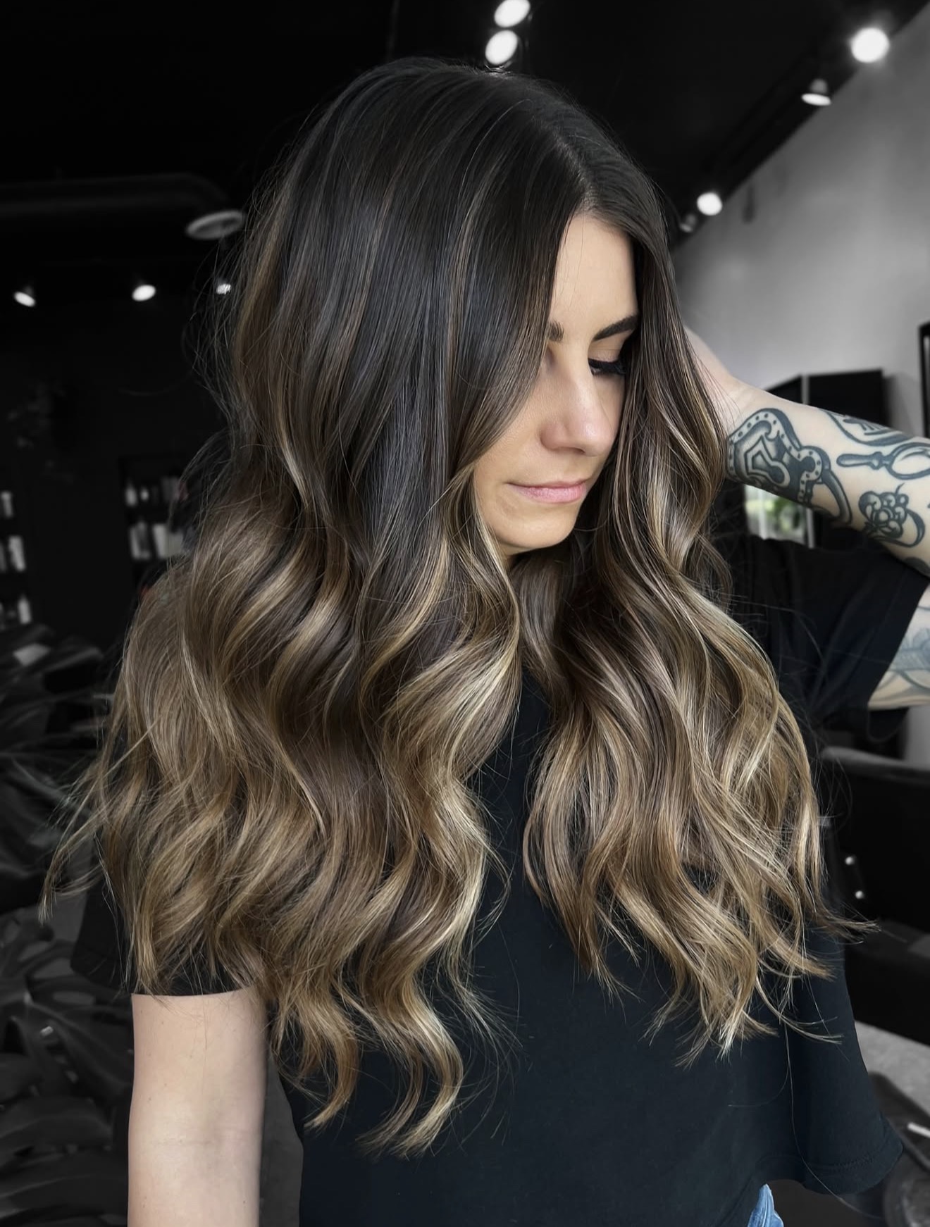 Beachy Bronde Waves With Sun-Kissed Highlights
