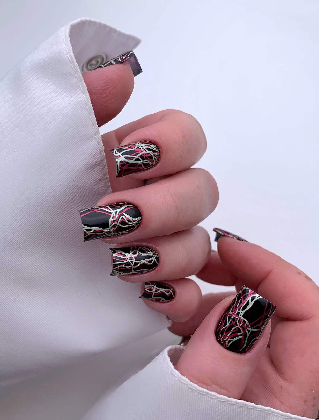 Black Glossy Square Nails with Abstract Red and Silver Lines