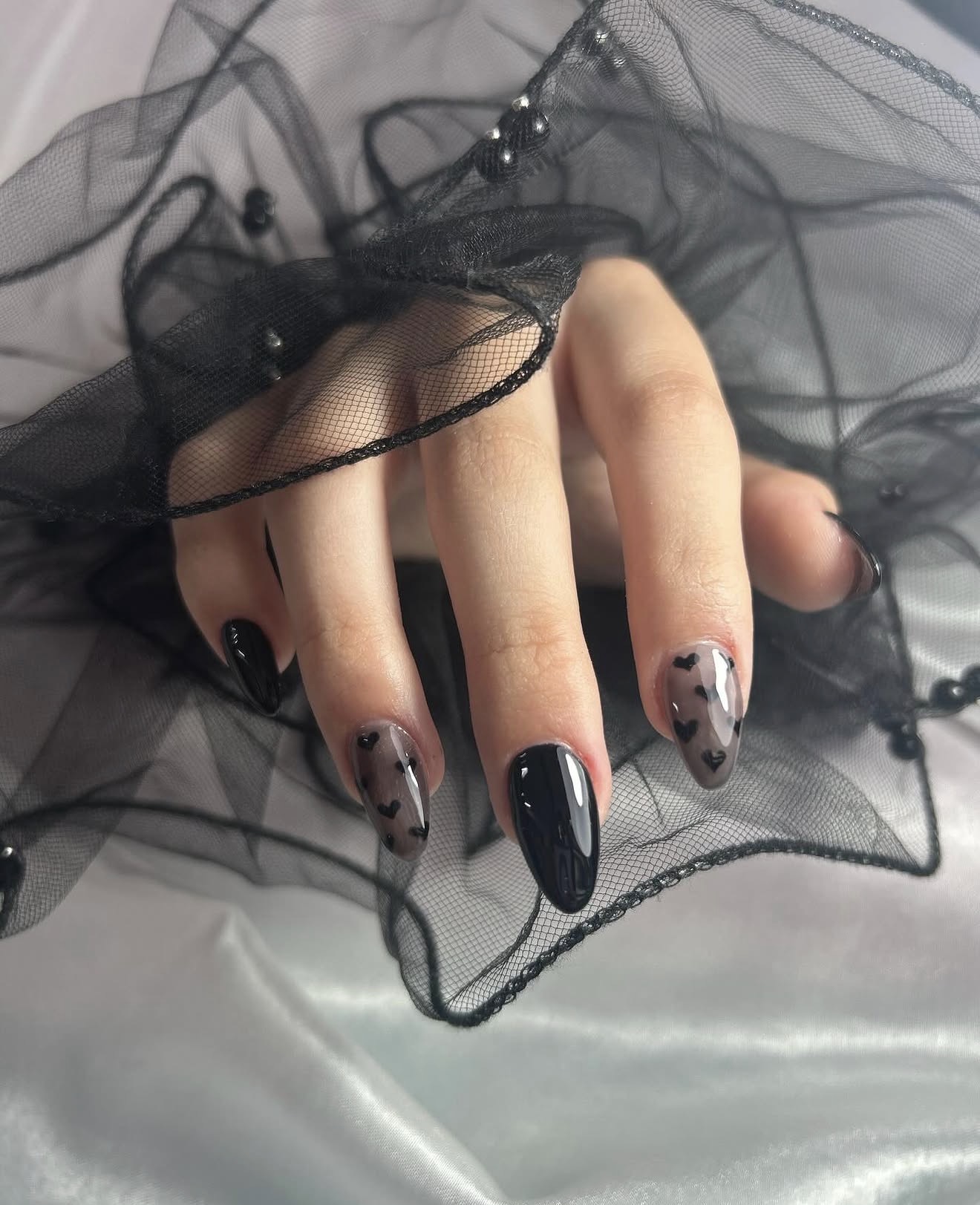 Black Heart Sheer Overlay Almond Nails