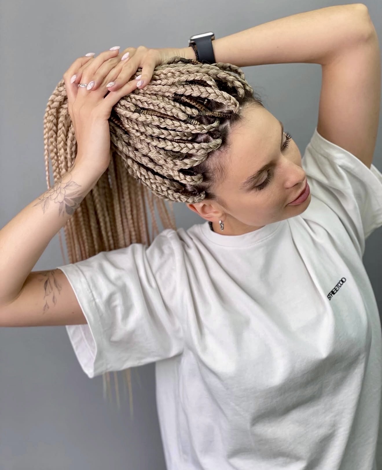 Blonde Box Braids Tied In High Ponytail